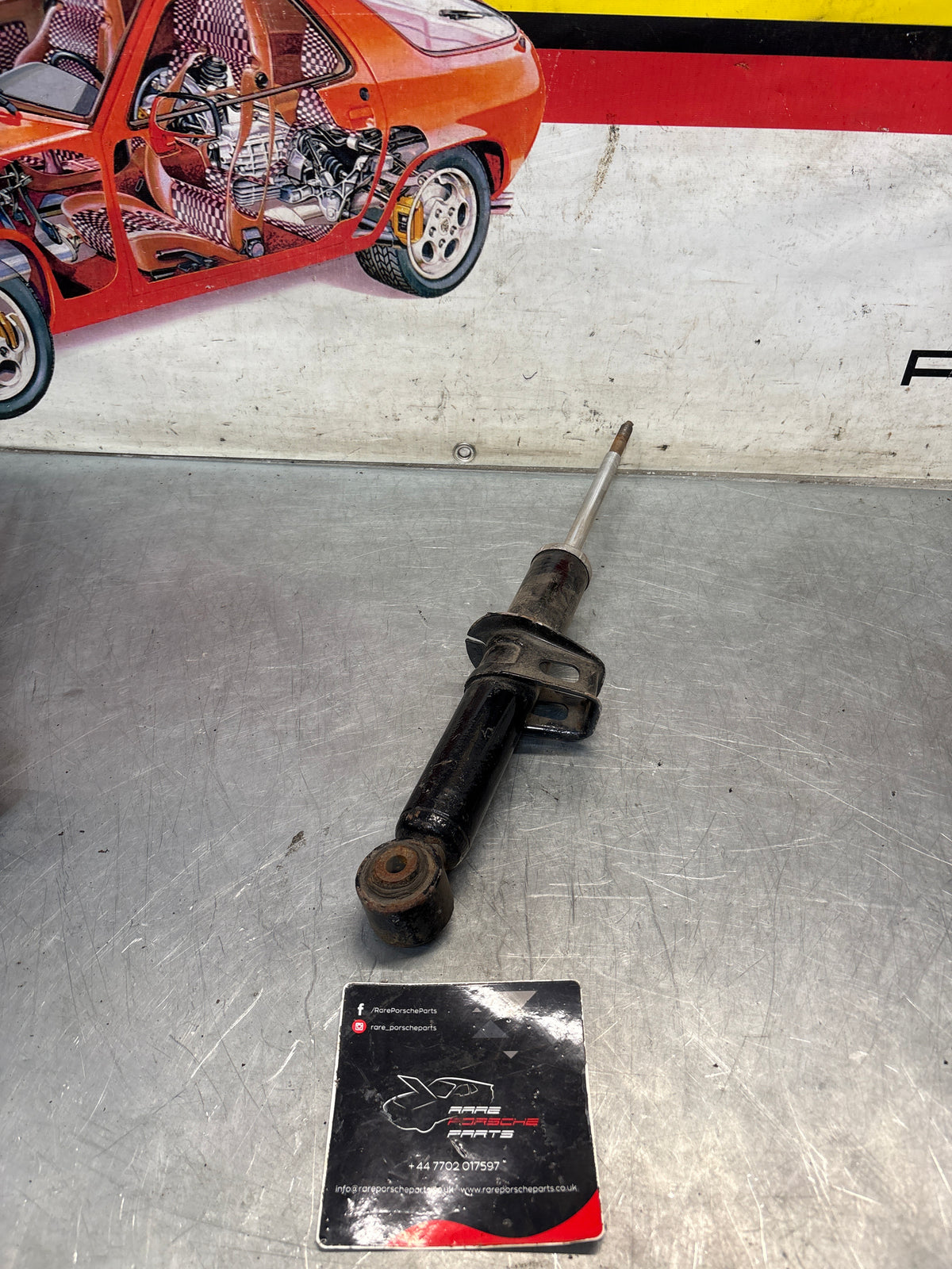 Porsche 911 993 rear shock absorber, used 99333305100