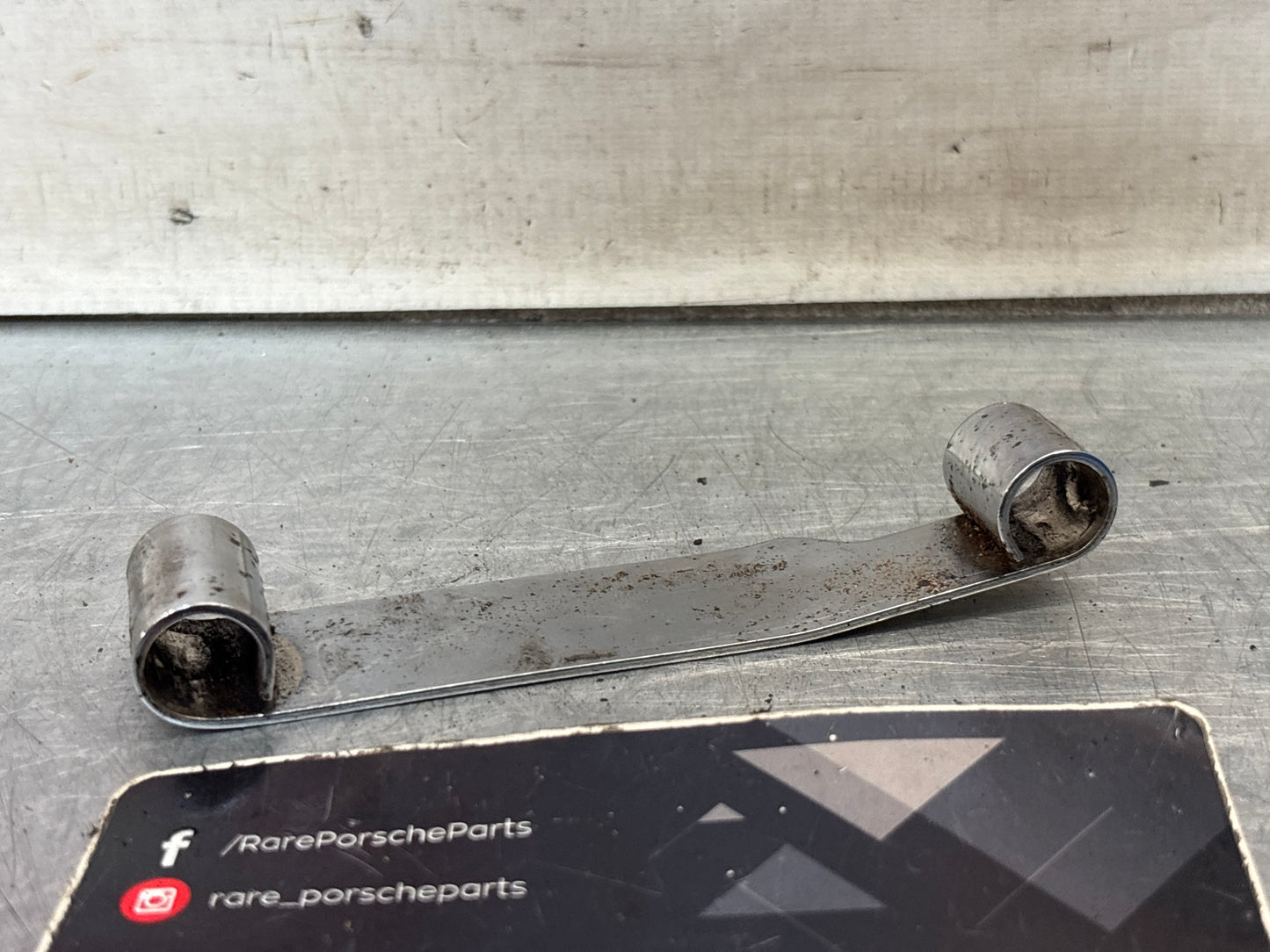 Porsche 924S 944 968 timing belt securing bracket, used 94410521301