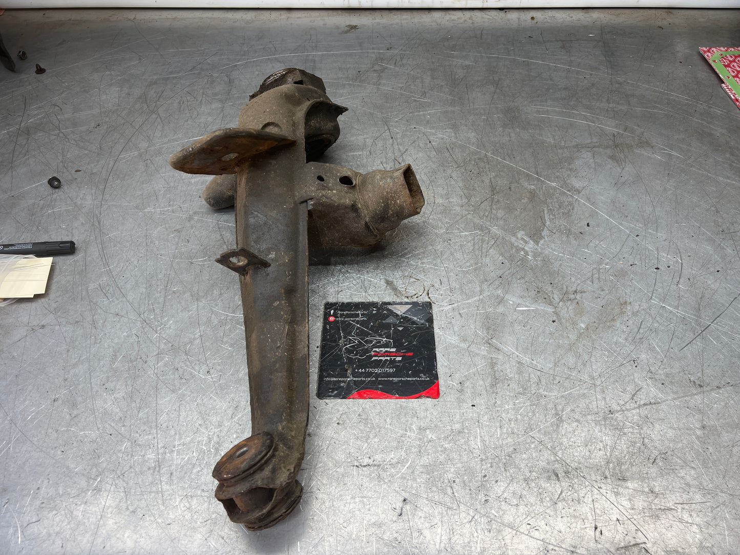 Porsche 924 944  -85.5 Rear left trailing arm, 94433102100