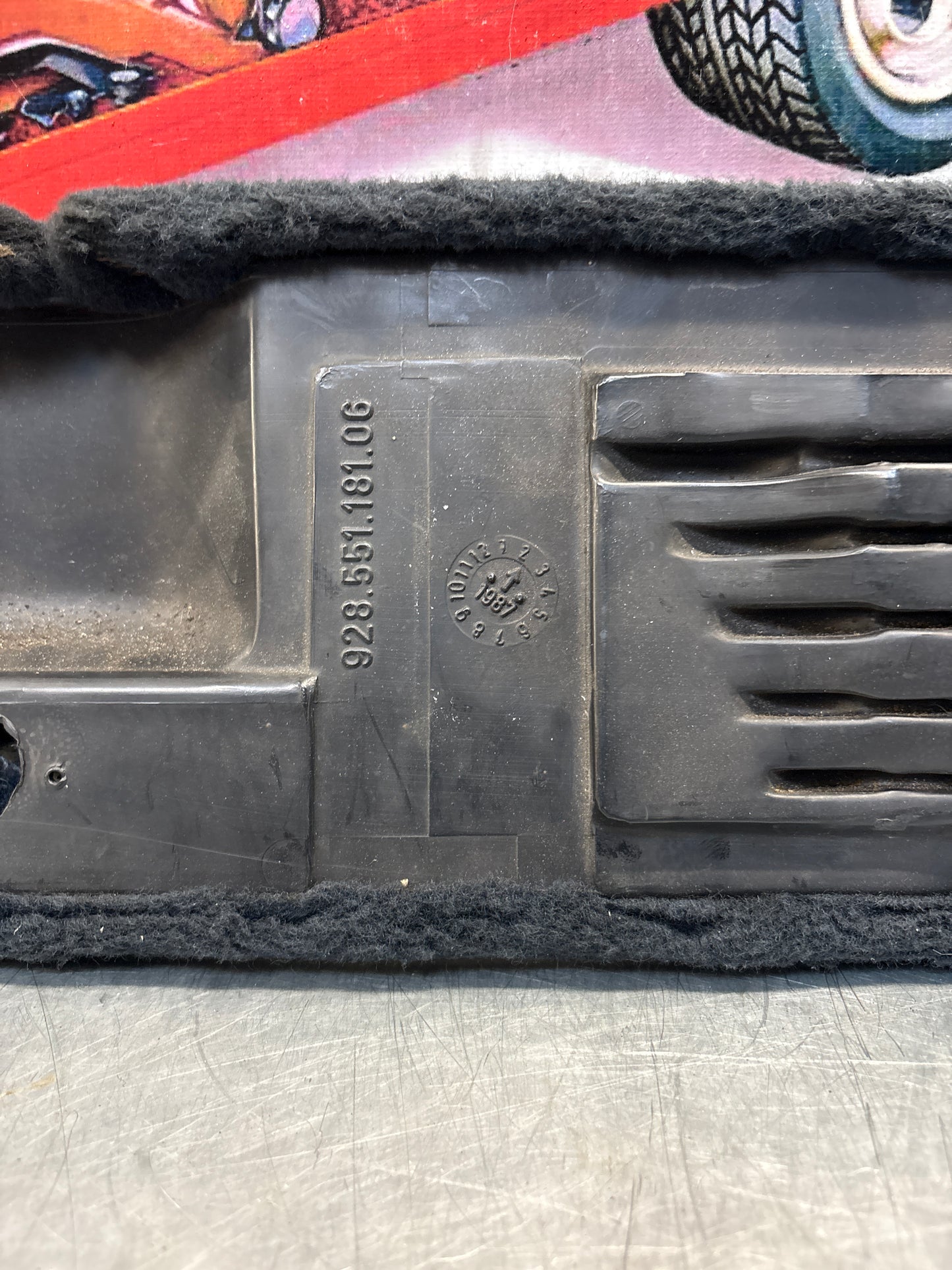 Porsche 928 black carpeted Tool kit panel cover, used 92855118106