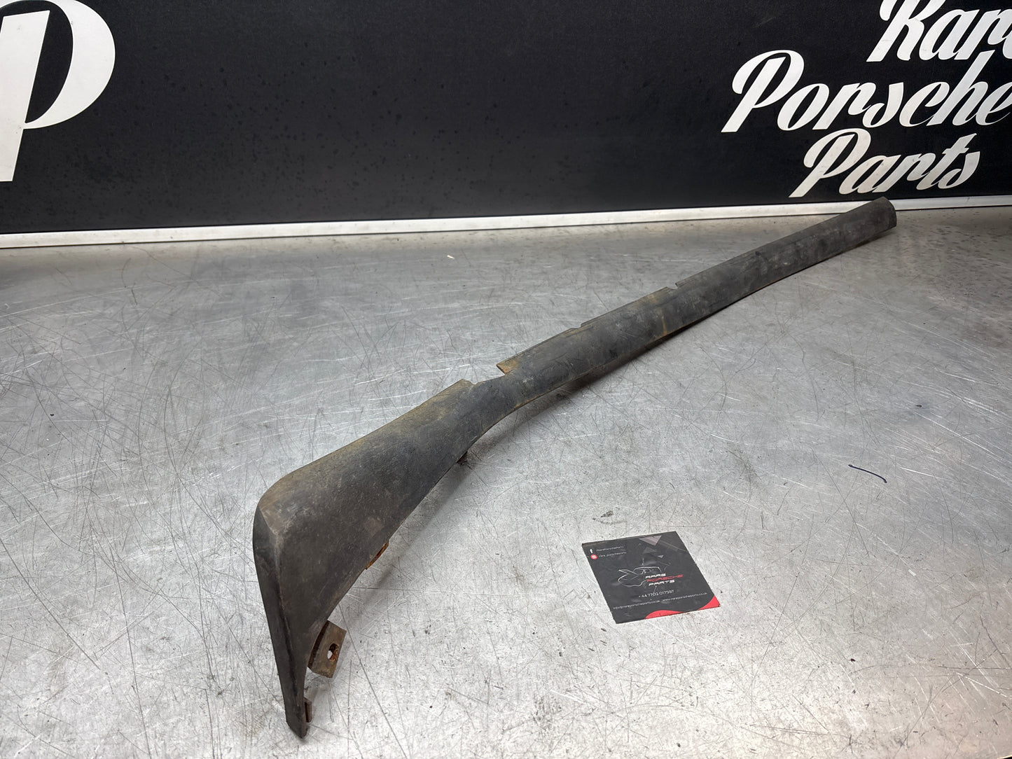 Porsche 944 lower door sill trim molding left side, used 95155919500