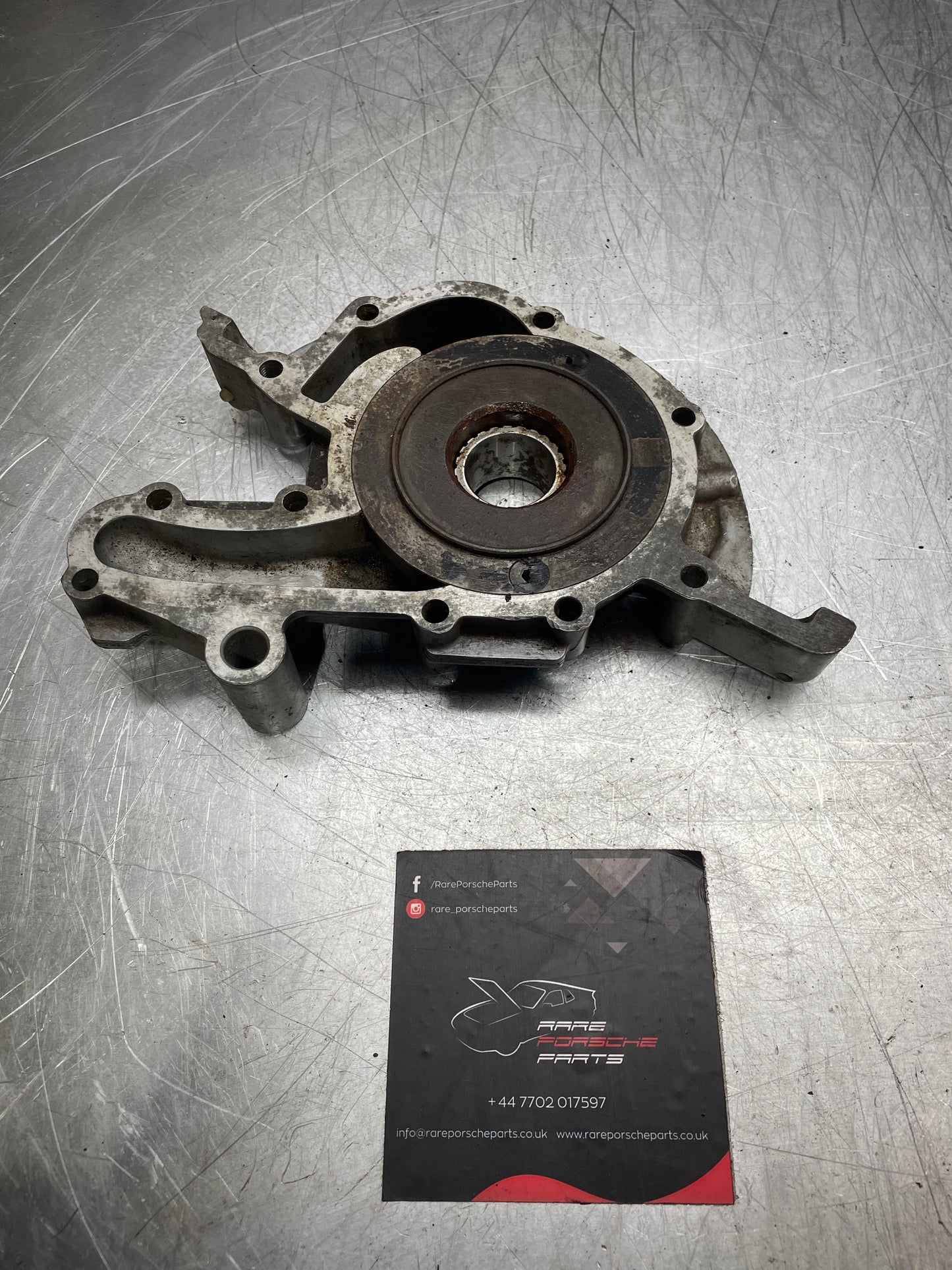 Porsche 944 oil pump assembly, used 944107104