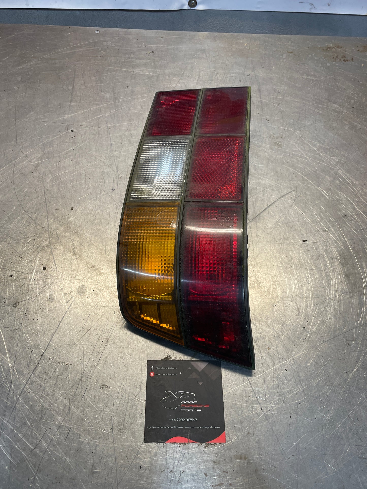 Porsche 924 / 944 left tail light, used