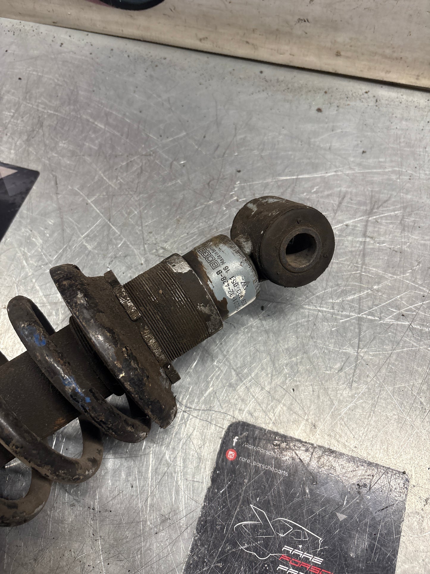 Porsche 928 rear shock absorber, used 92833305116