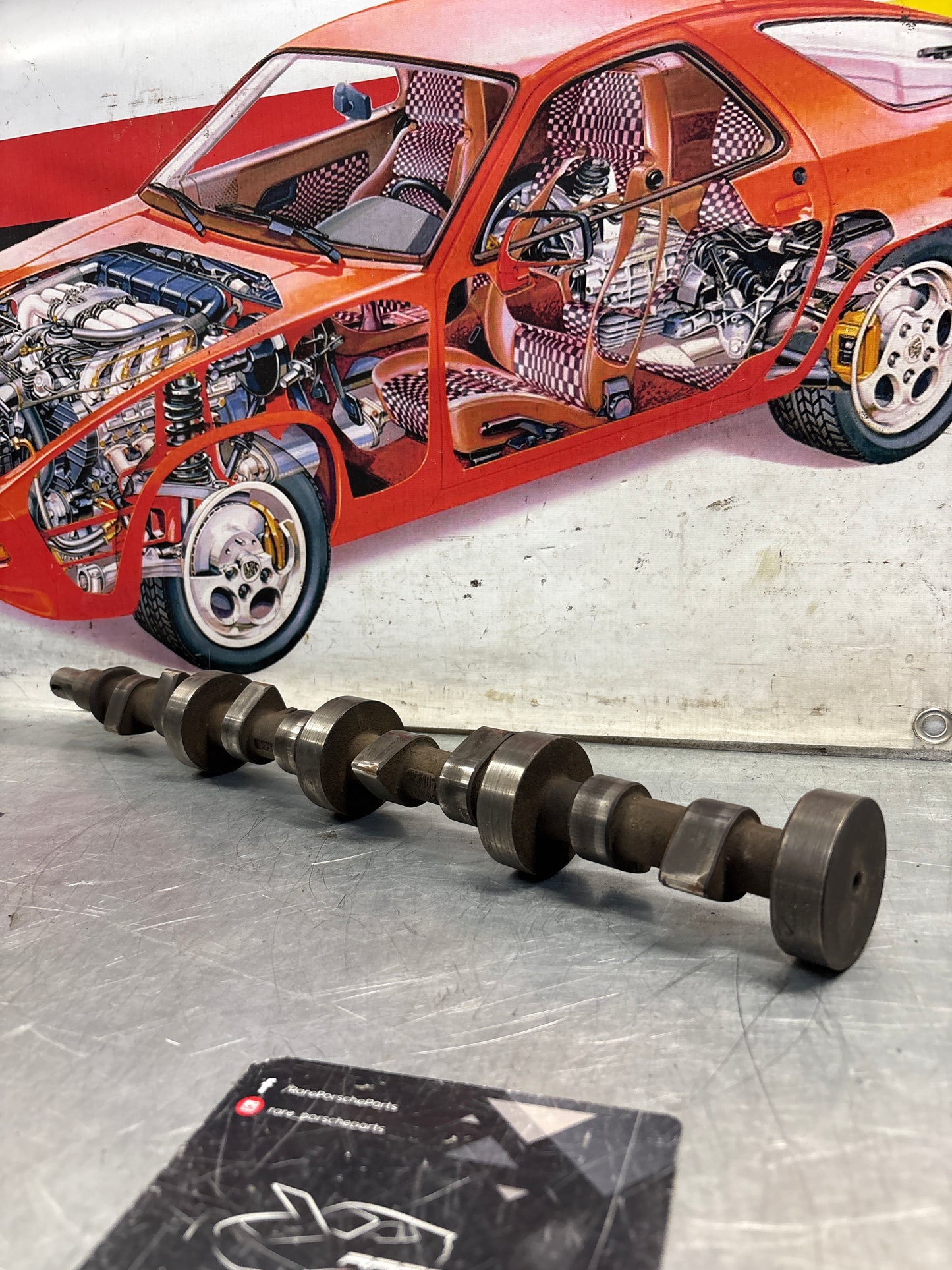 Porsche 928 cam shaft, used 9281052030R