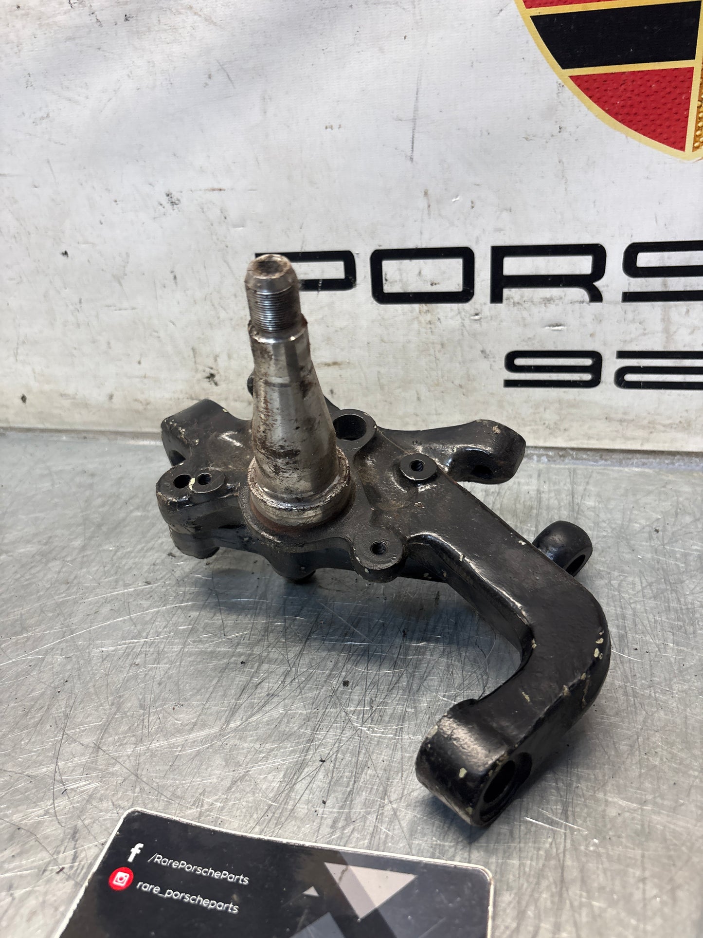 Porsche 928 left steering spindle knuckle, used 92834105717 / 92834105723
