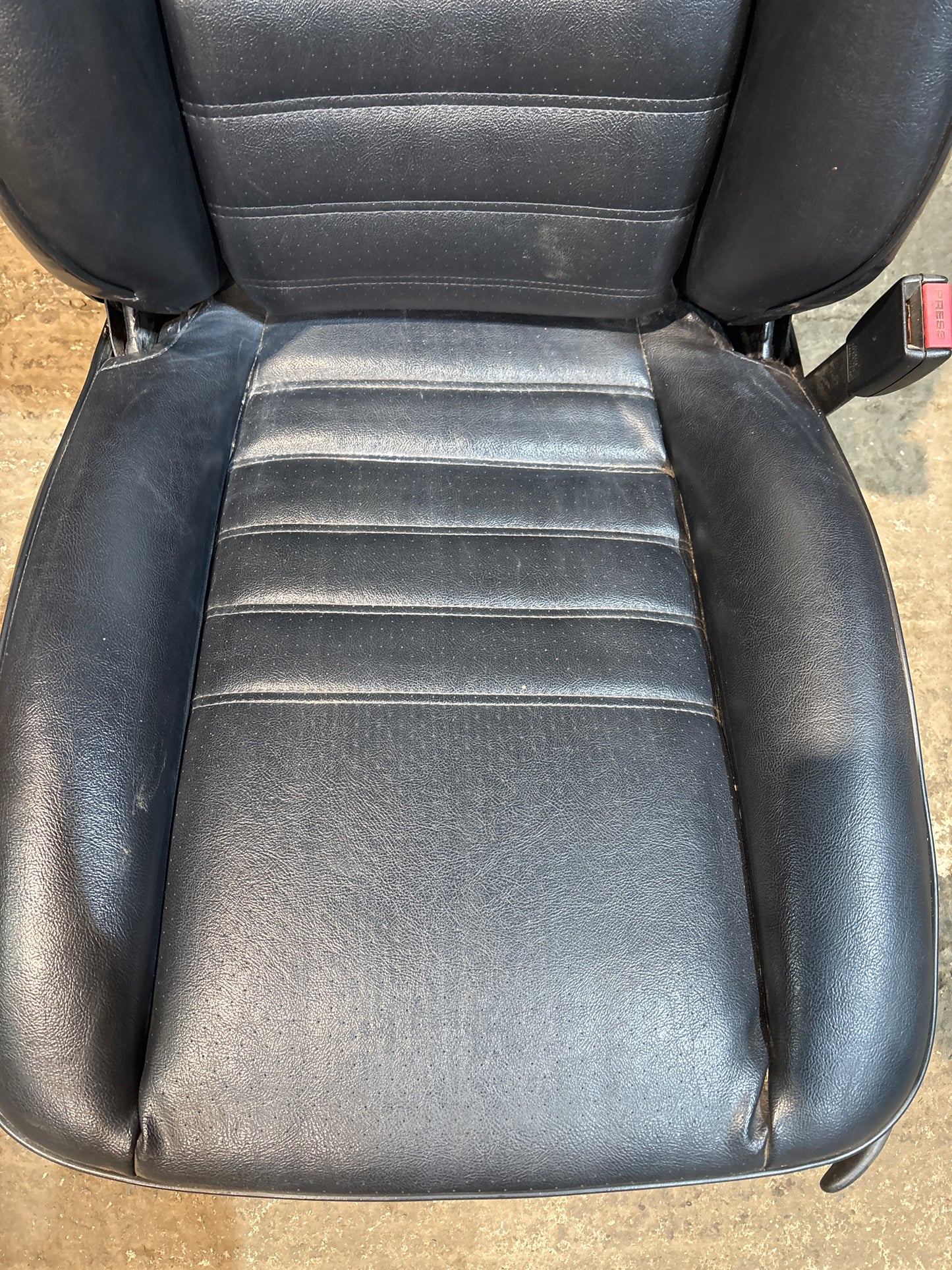Porsche 944 black front right seat with Porsche scripted fabric