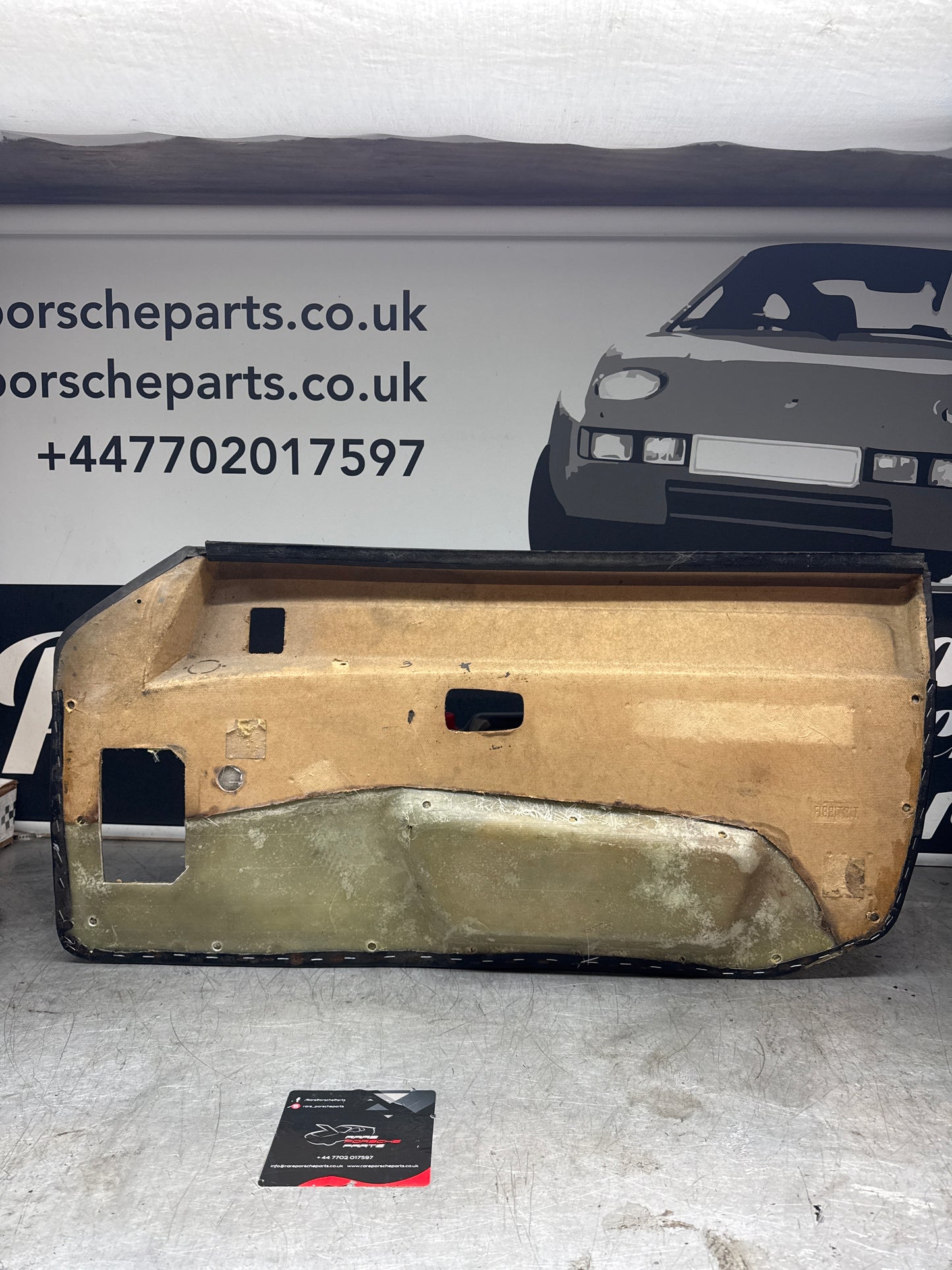 Porsche 924/ Early 944 black RHD Left door card. Fibreglass repaired. 477867012