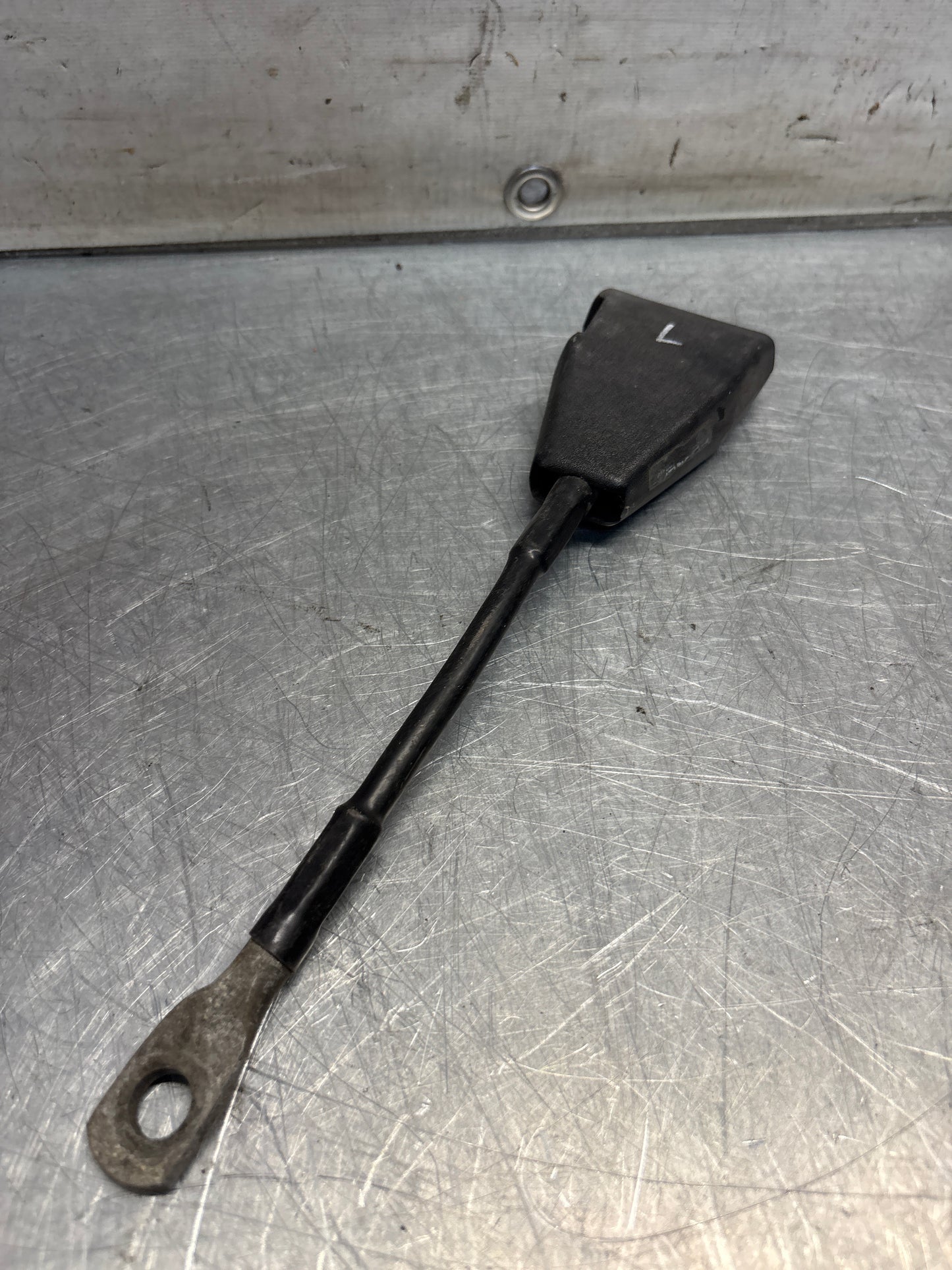 Used Porsche 924 early left seat belt anchor clasp retainer, buckle. 477857755D (used)