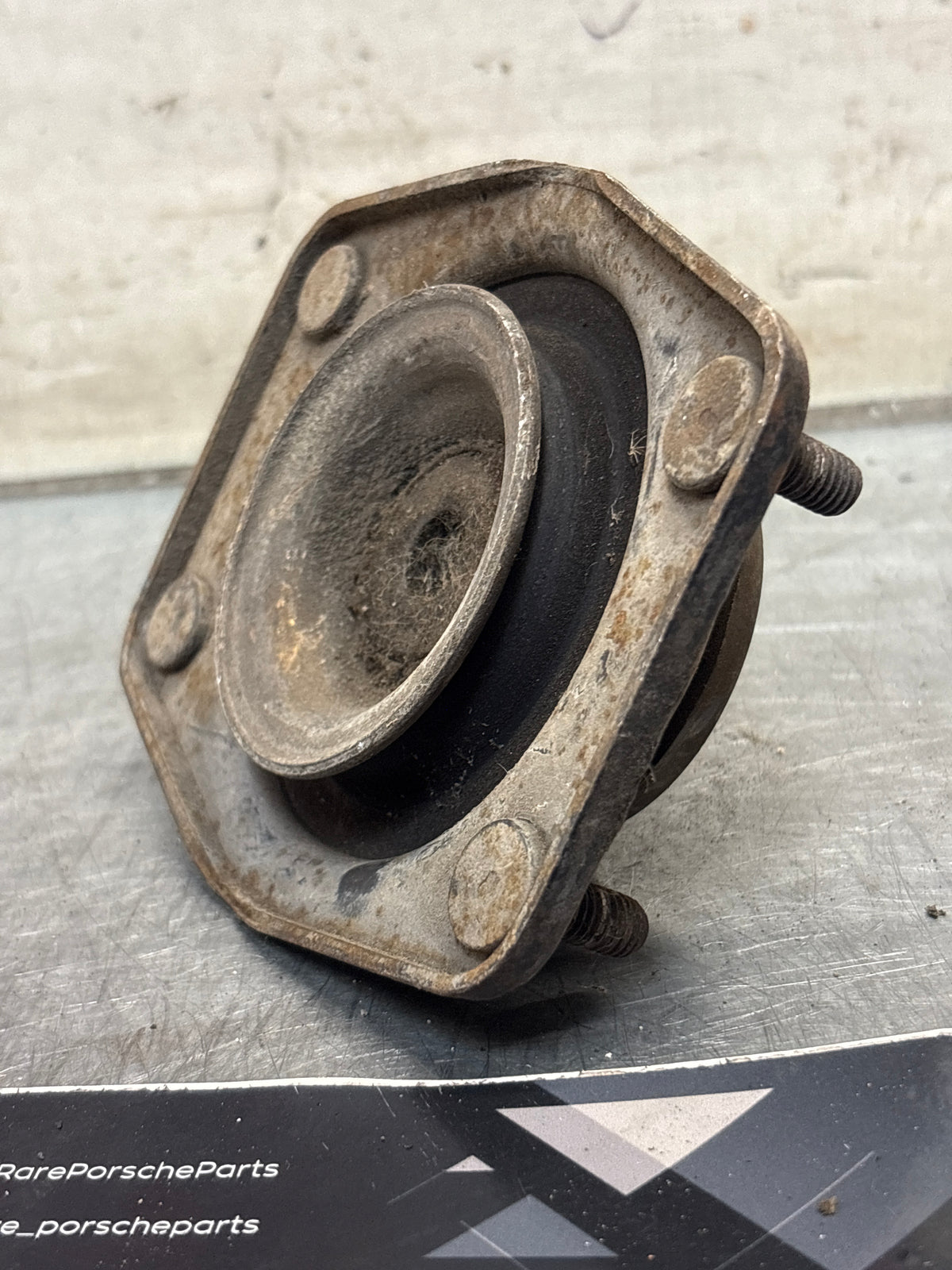 Porsche 924 / 944 front suspension bearing flange, 477412345, used