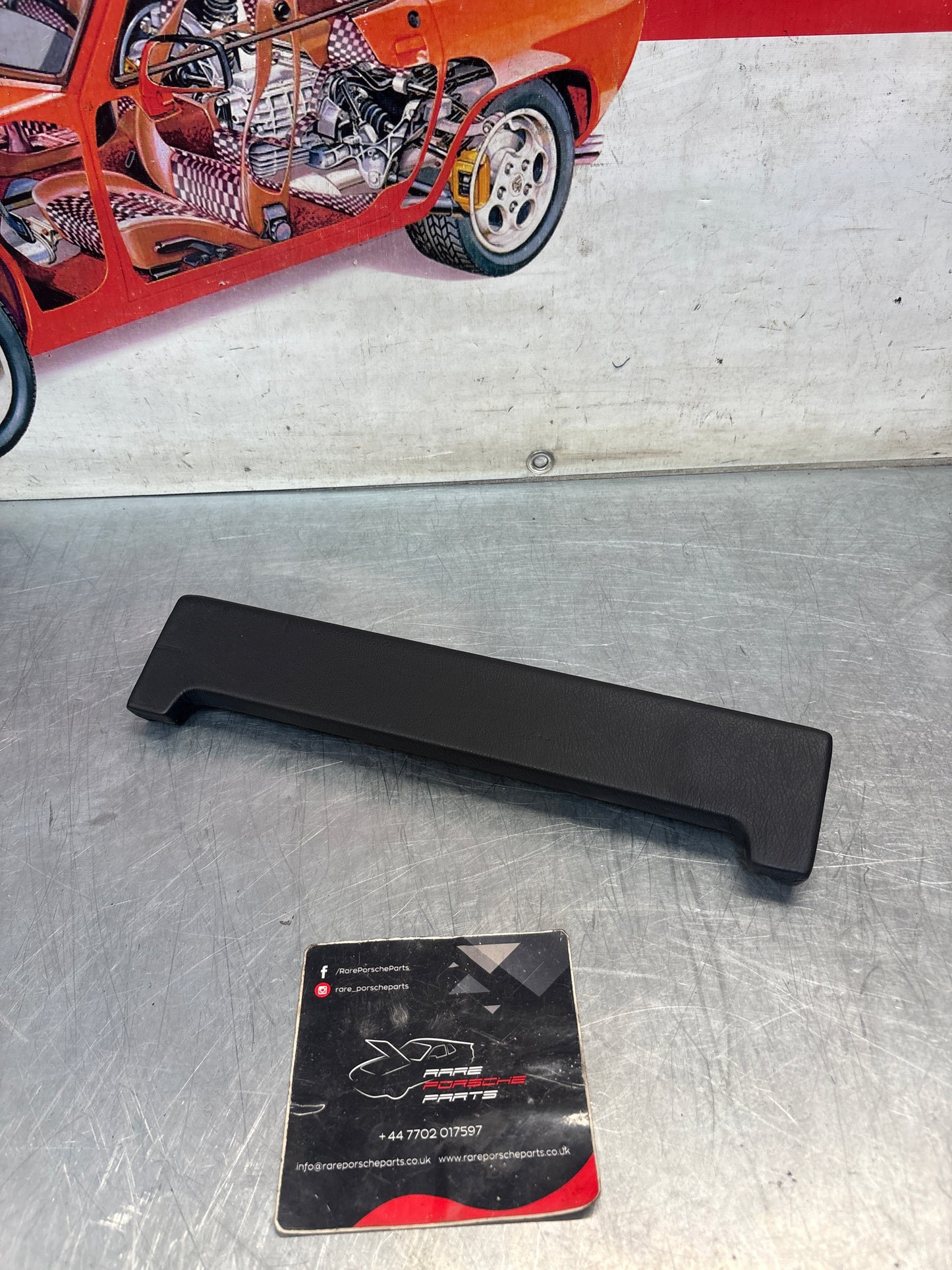 Porsche 928 door armrest lid, 928555233501, black genuine