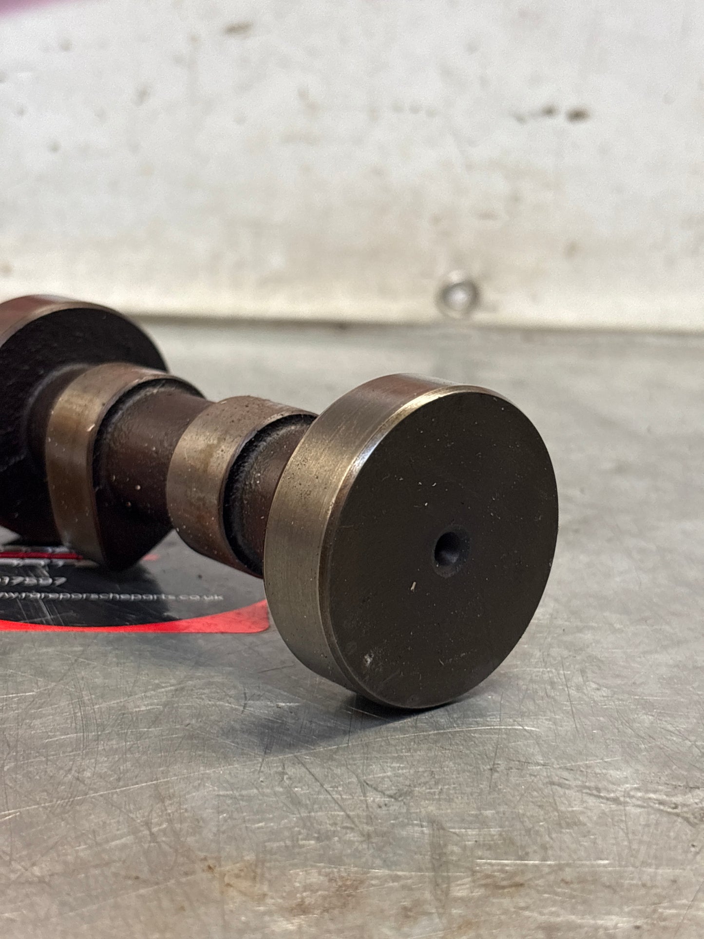 Porsche 928 cam shaft, used 9281051563R