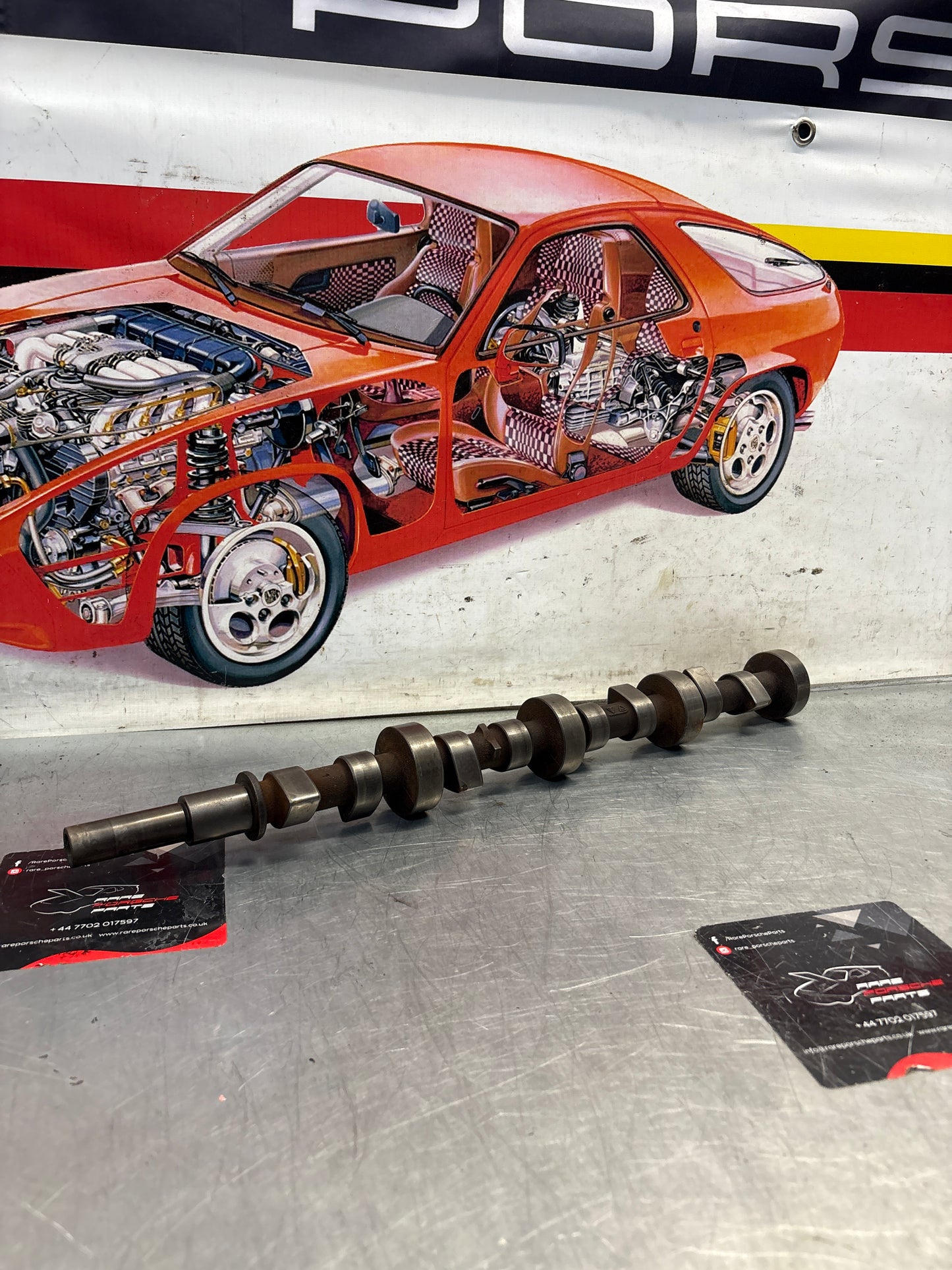 Porsche 928 cam shaft, used 9281052040R