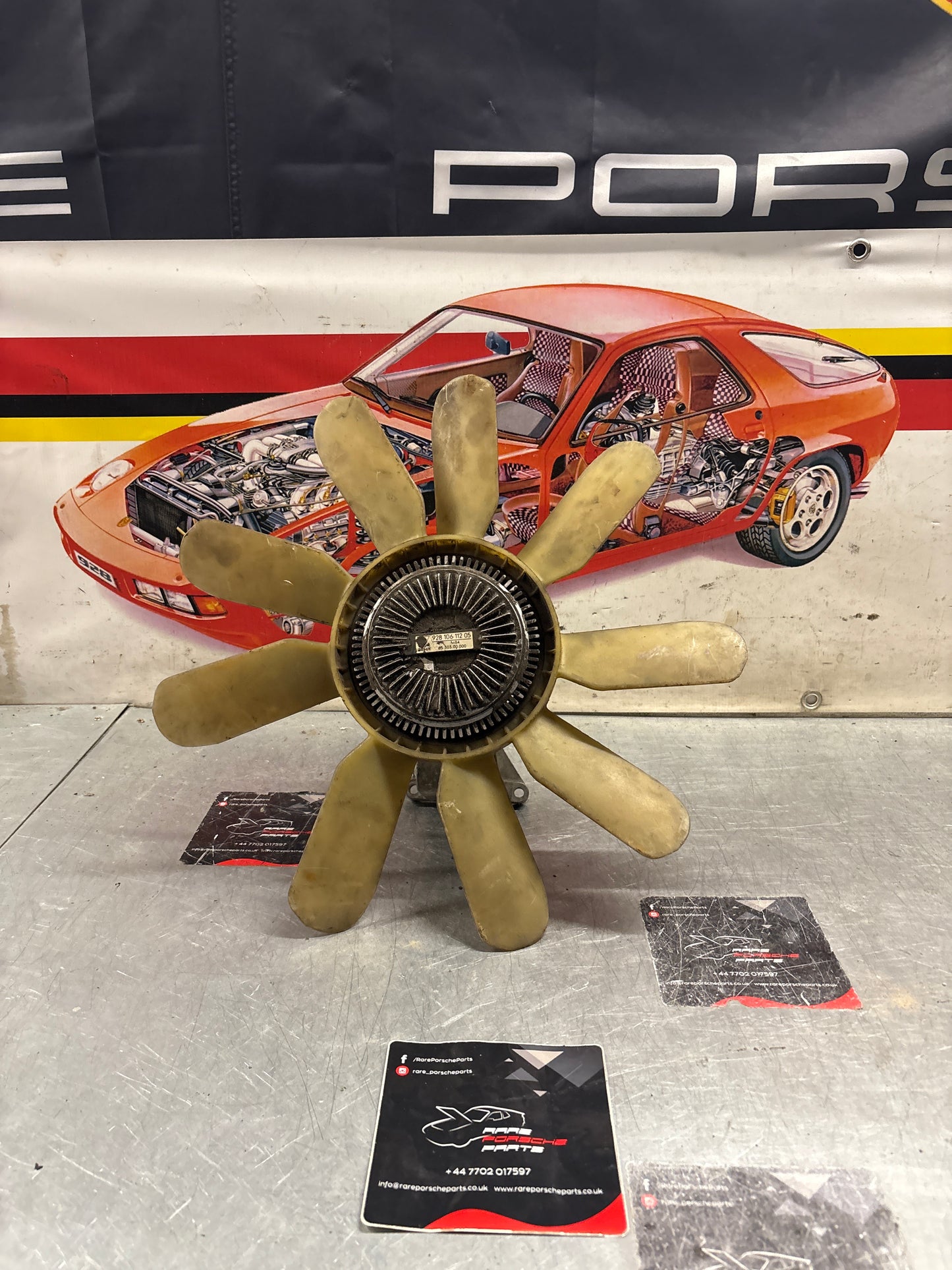 Porsche 928 late engine cooling fan clutch with bracket, used 92810611205 / 92810613701 / 9281061104R