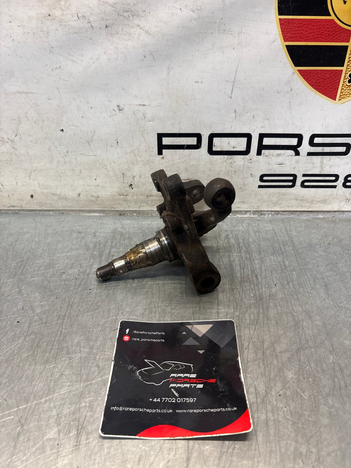 Porsche 928 left steering spindle knuckle, used 92834105703