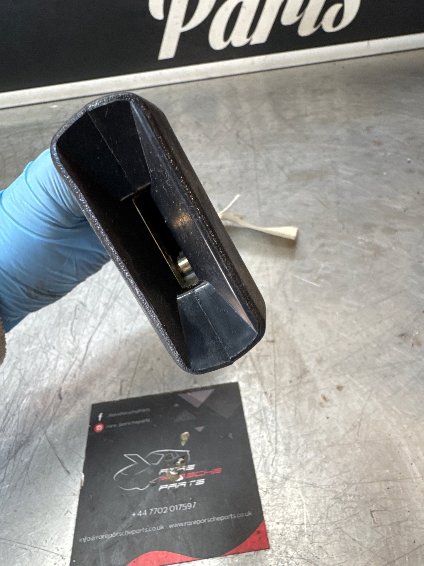 Porsche 924 early left seat belt anchor clasp retainer, buckle. 477857755D NOS