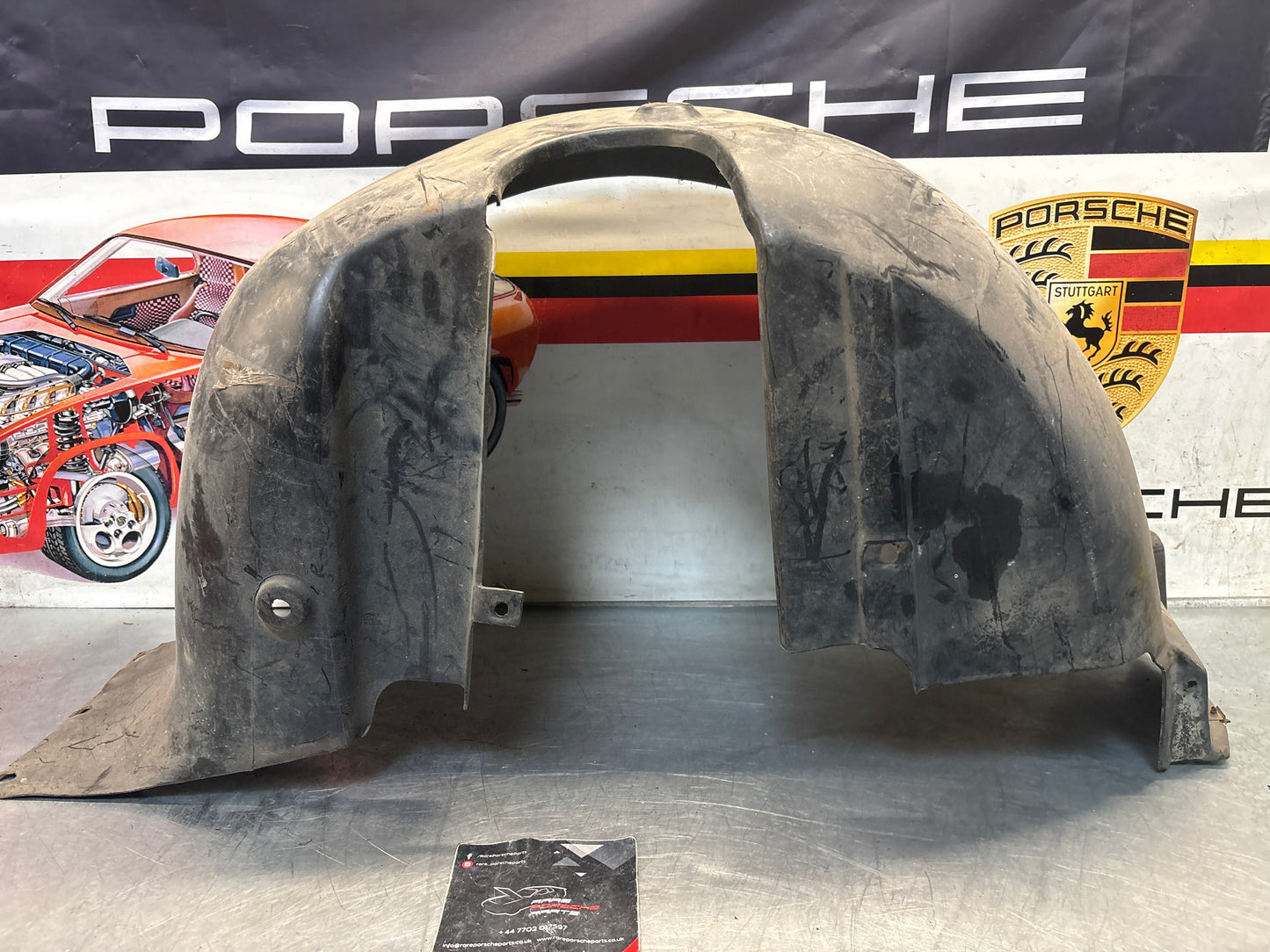Porsche 944 from 85.5 wheel arch liner  Left, 94450438101 Used