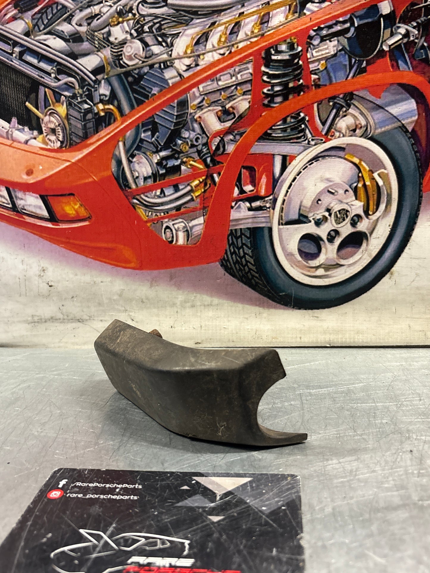 Porsche 924 / 944 front right bumper guard, used 477807156A