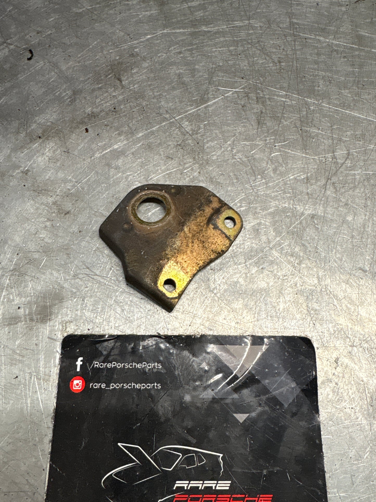 Porsche 944 fuel line support bracket, used 94411038103