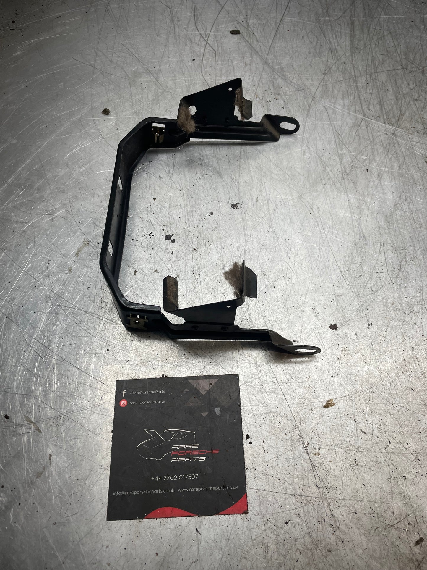 Porsche 944 center console bracket, refurbished 94455206702