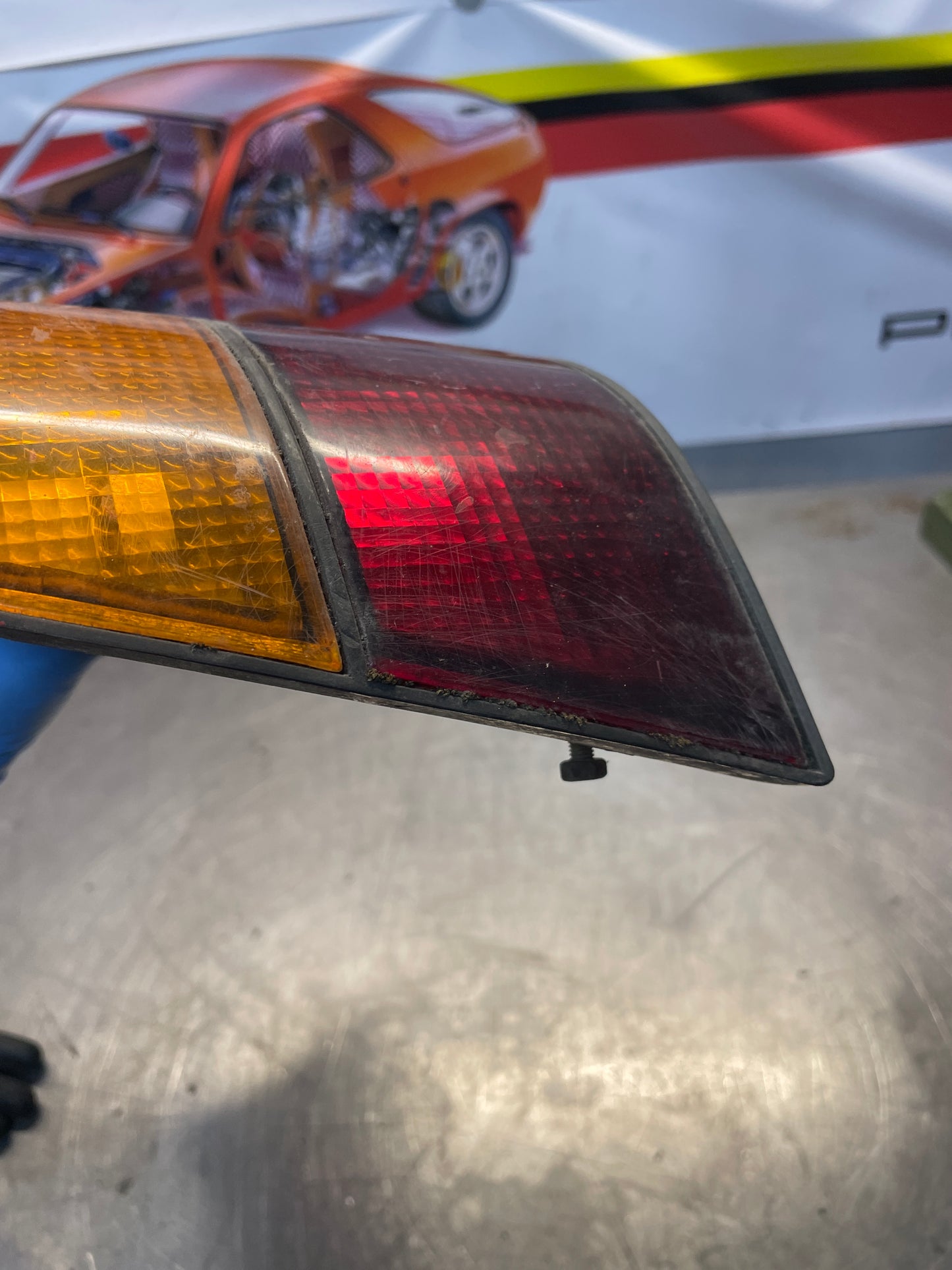 Porsche 924 / 944 left tail light, used, cracked