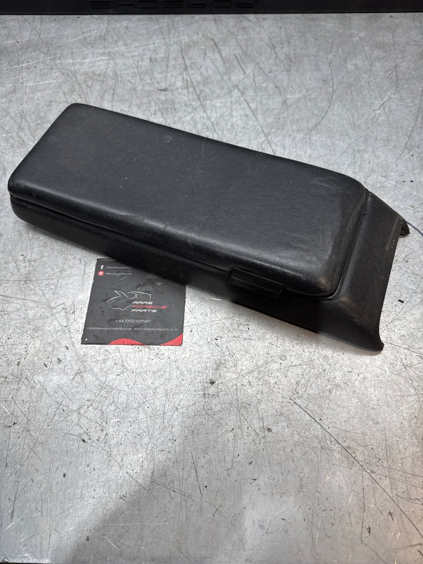 Porsche 928 92755572903 Central armrest cassette compartment black, used RHD