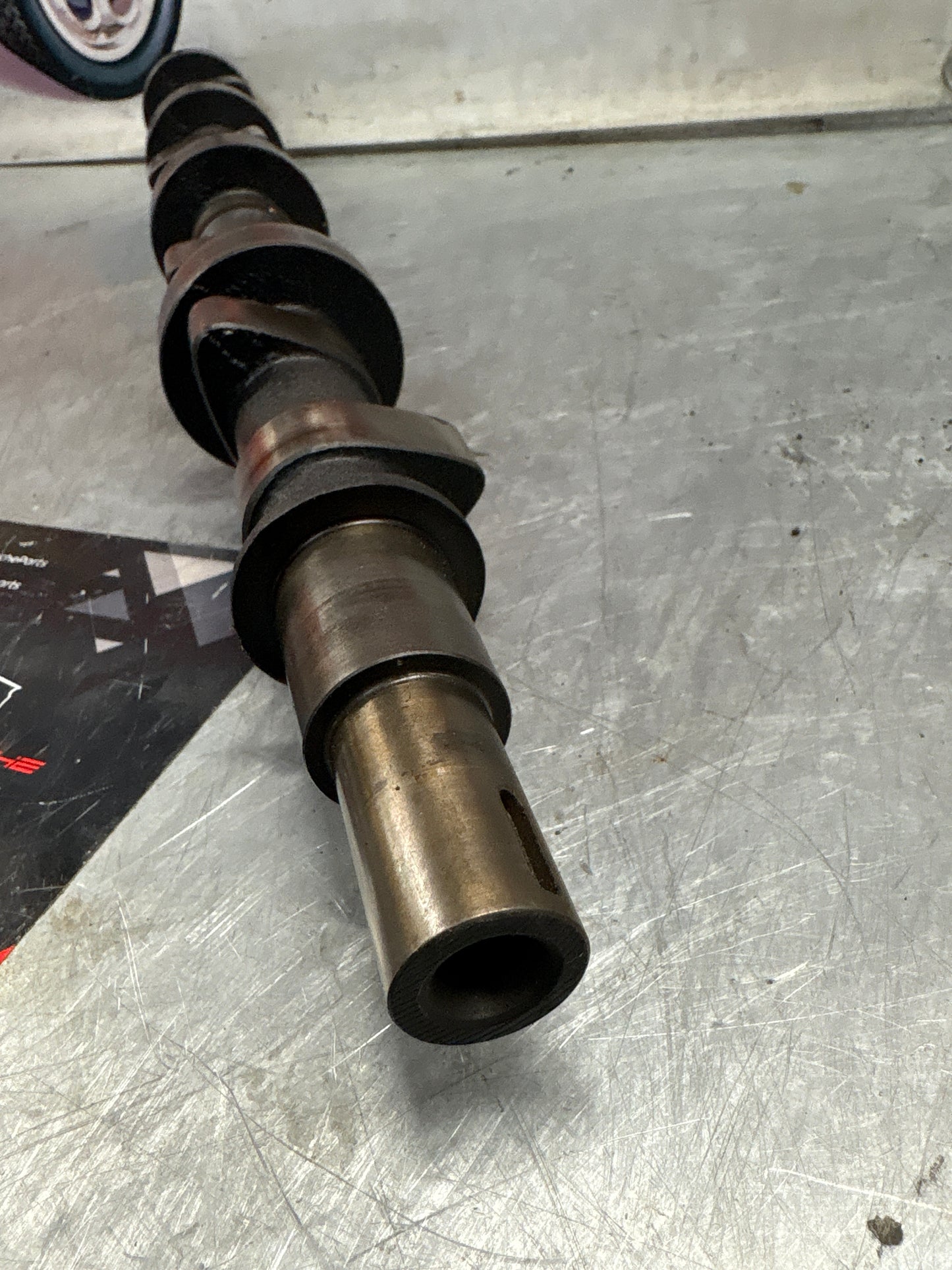 Porsche 928 cam shaft, used 9281051870R