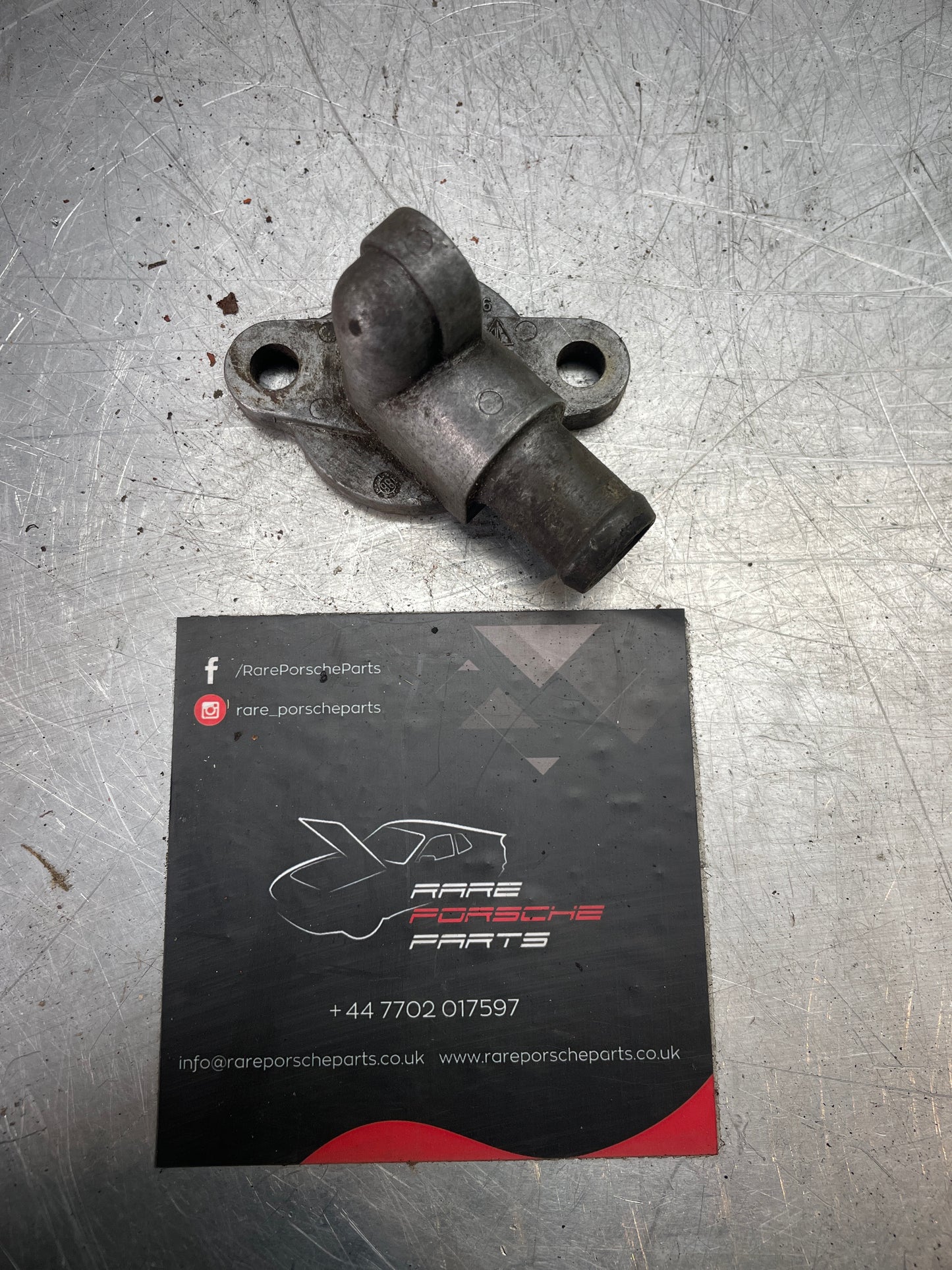 Porsche 928 S4 connection piece, used 9281047132R