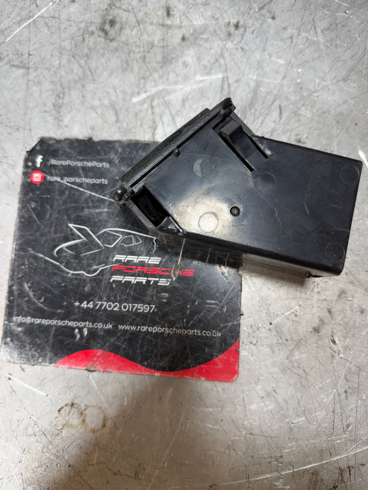 Porsche 924/944 Black dash air vent. Right, with connecting piece 477819232 / 477819717 used spares or repair