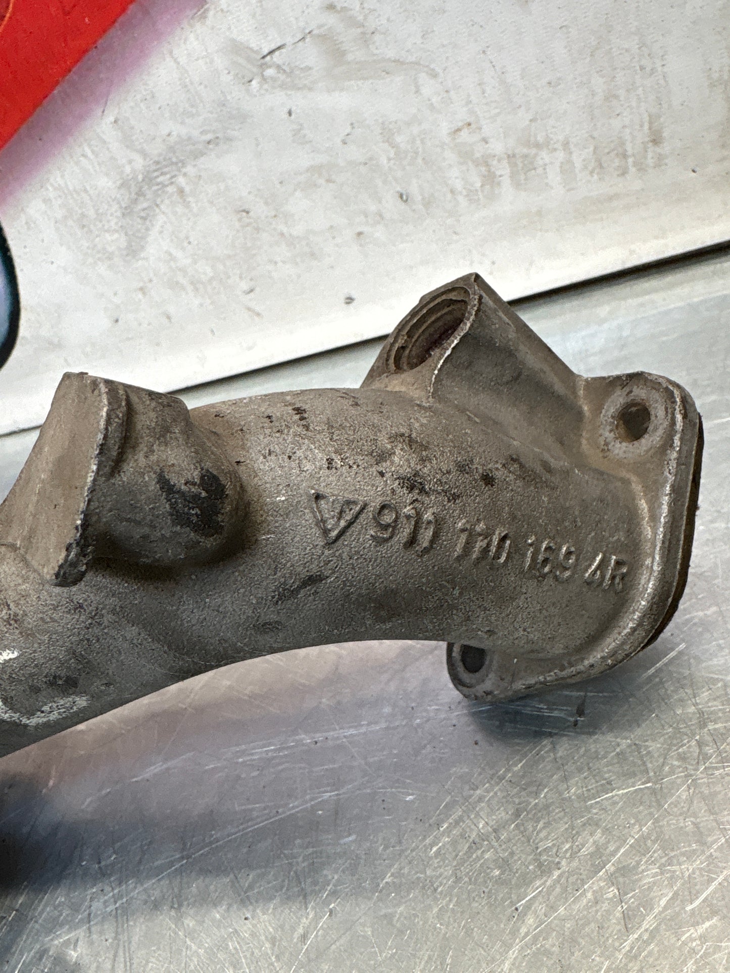 Porsche 911 SC Intake pipe inlet, used 9111101694R