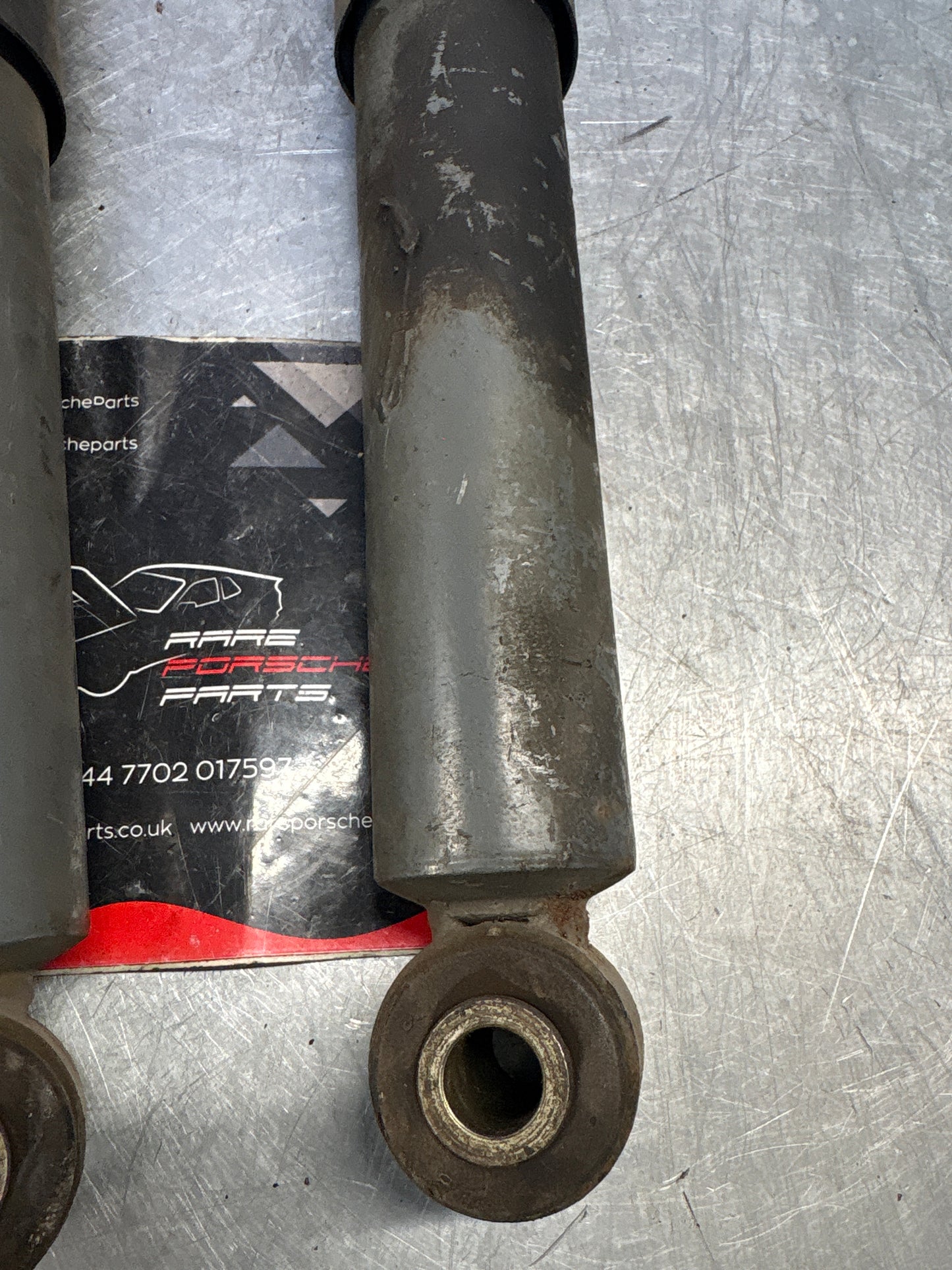 Porsche 944 86- pair of rear suspension shock absorbers, used 95133303206