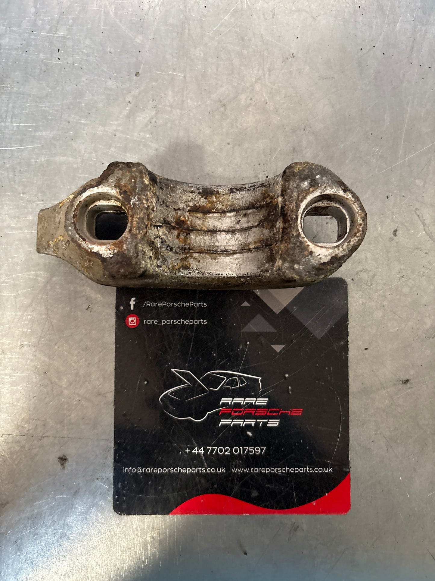 Porsche 928 rear left shock absorber bracket, used 92834116701