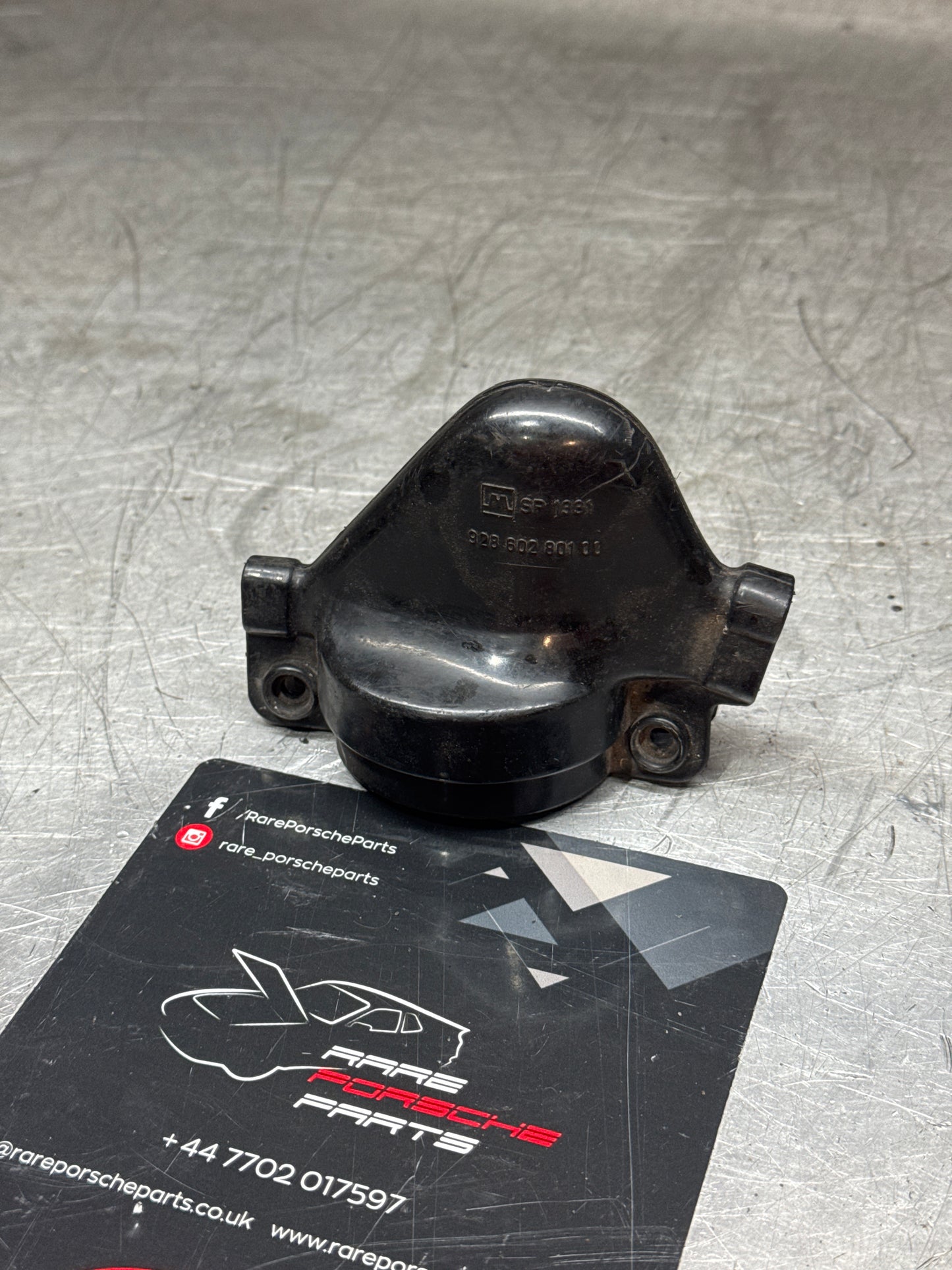 Porsche 928 coil cap / protector. Used. 92860280100