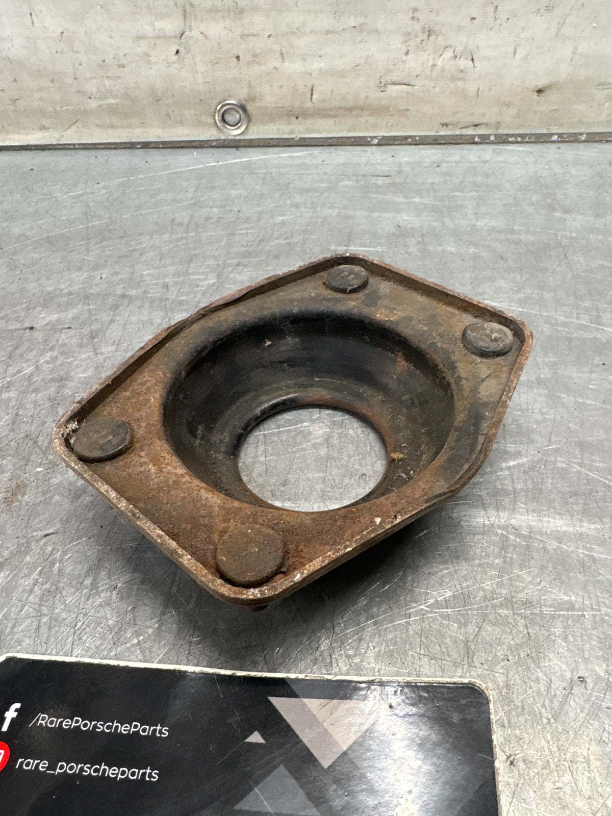 Porsche 924 / 944 front suspension bearing flange, 477412345, used