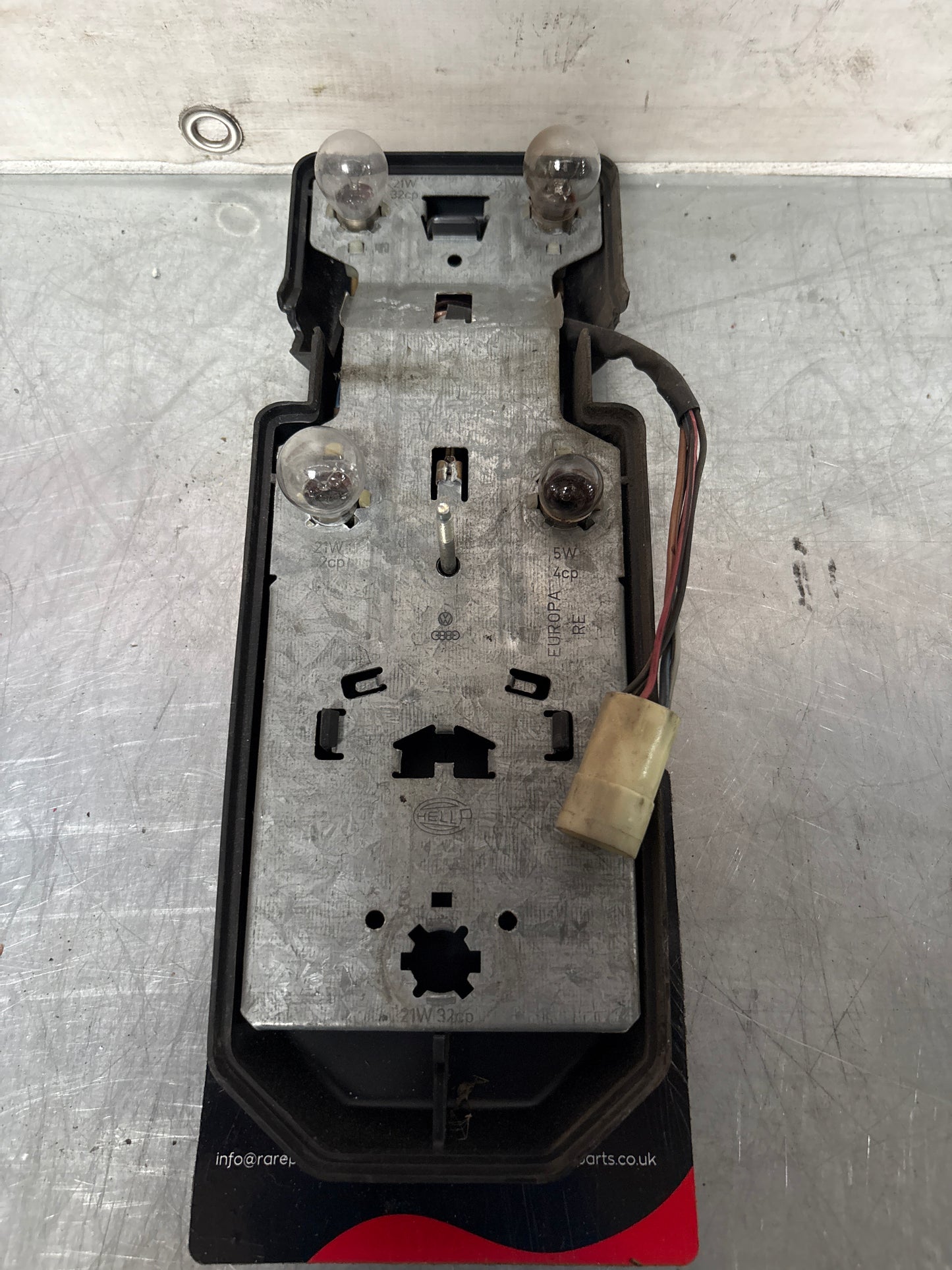 Porsche 944 rear left Tail light lamp bulb holder and cover, used 477945113