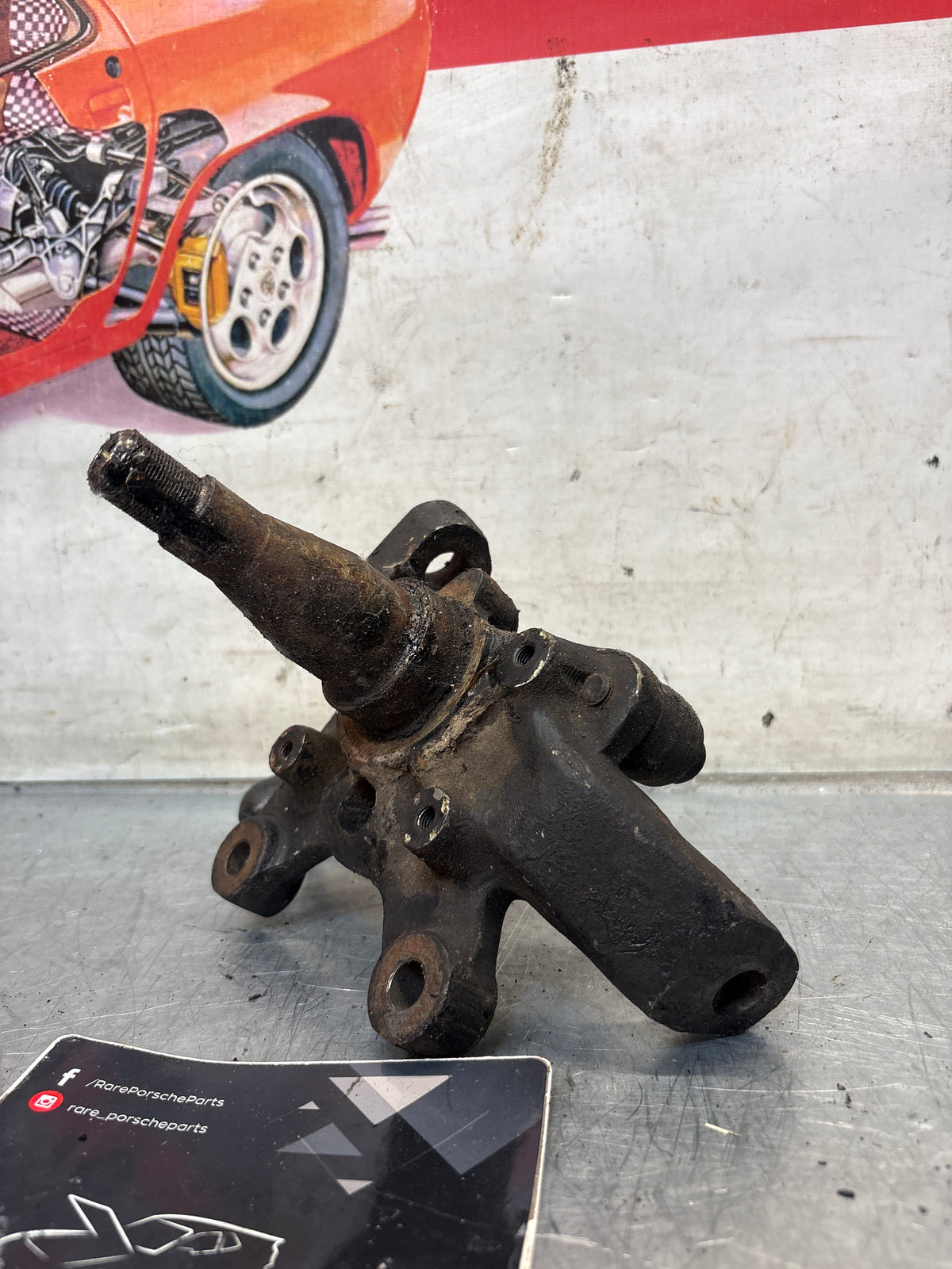 Porsche 928 left steering spindle knuckle, used 92834105713