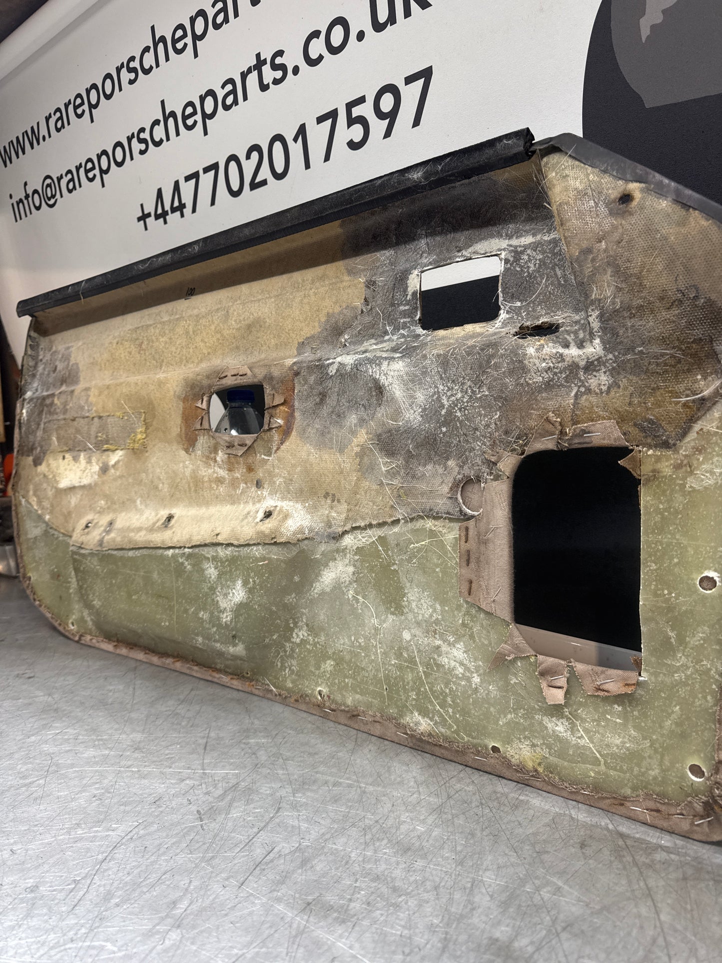 Porsche 924 / Early 944 Black Porsche script door cards. Right Hand Drive, Used. 478867011. Fibreglass repaired