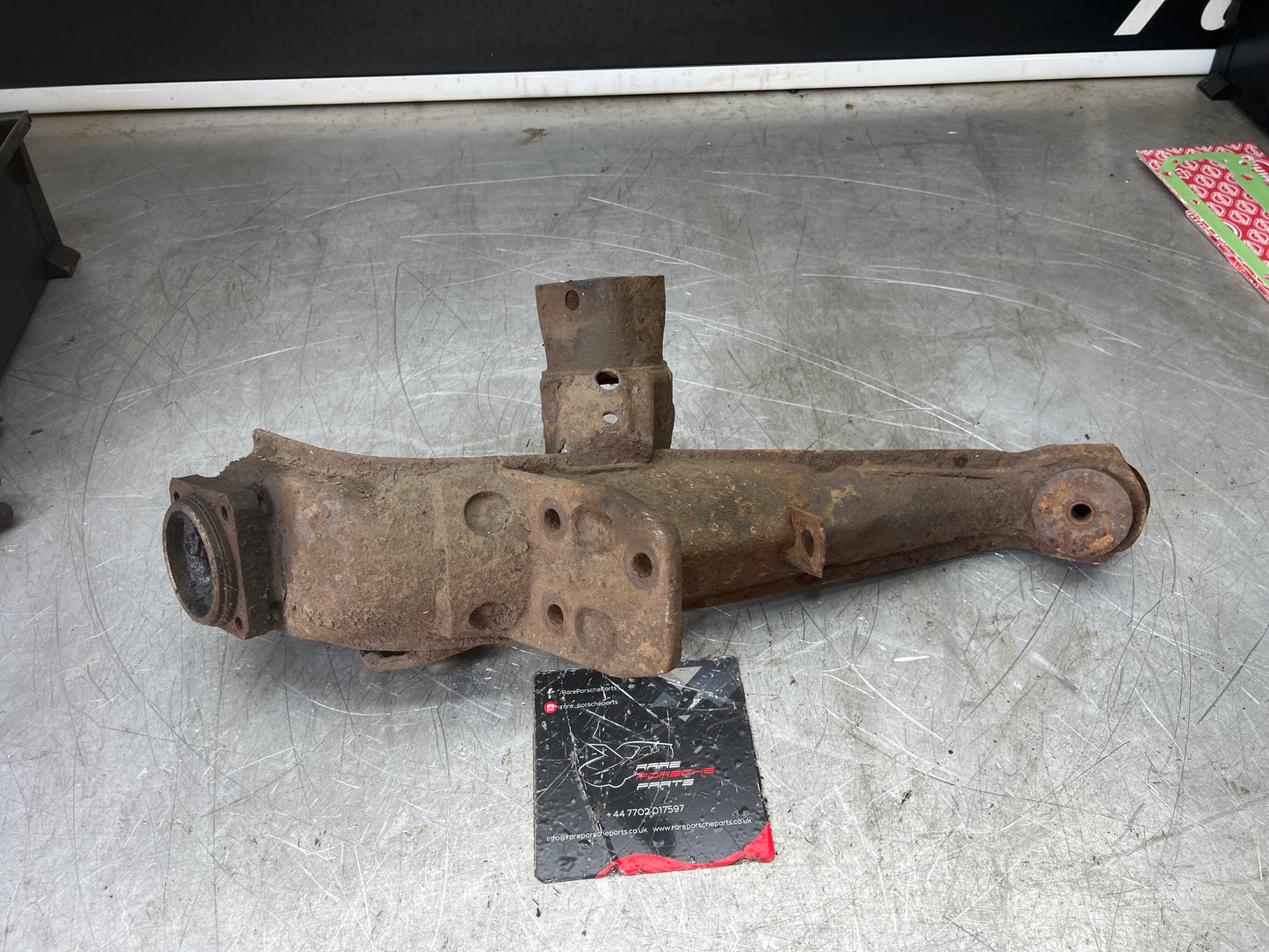 Porsche 924 944  -85.5 Rear left trailing arm, 94433102100
