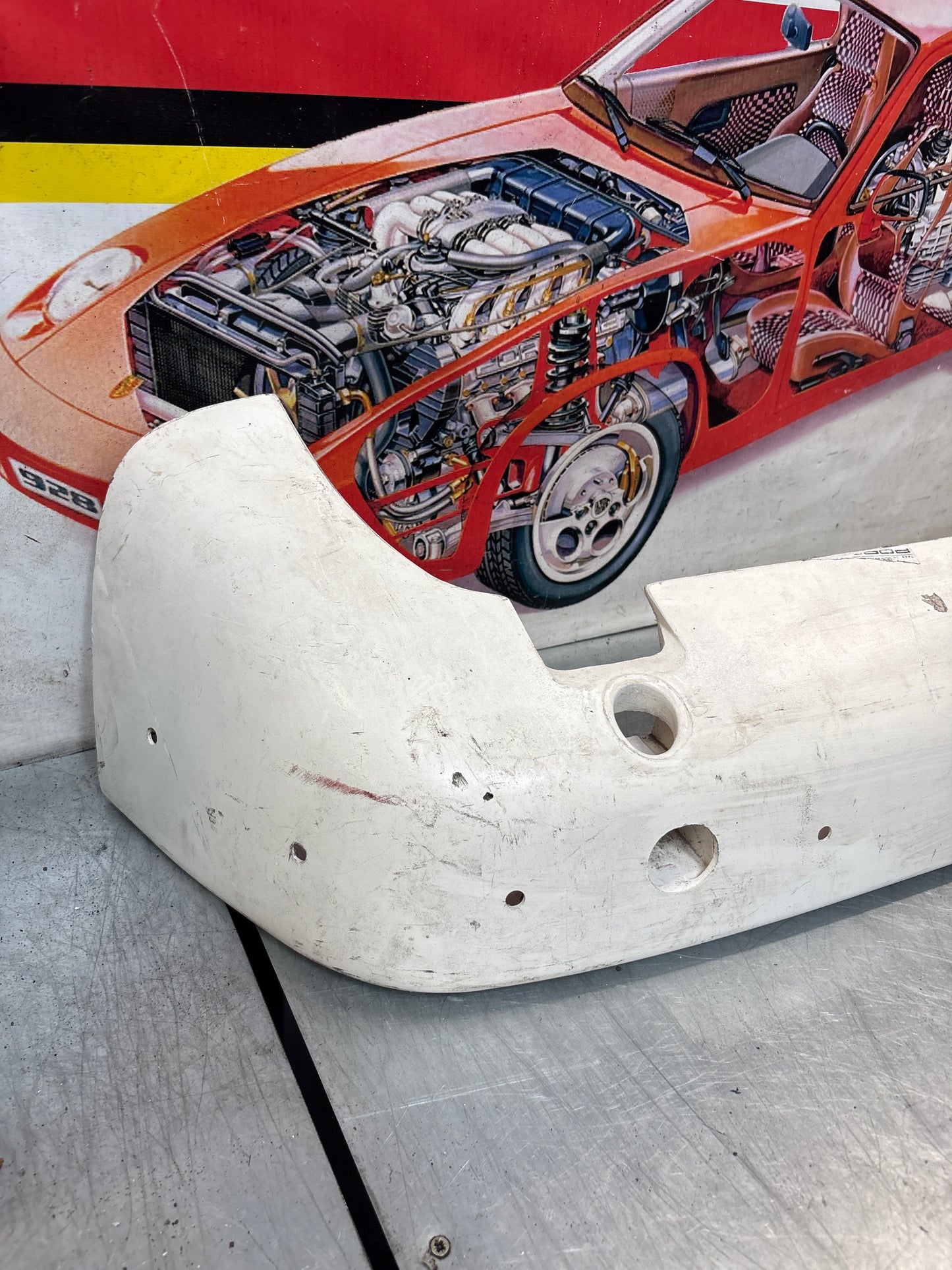 Porsche 944 rear bumper, NOS damaged 93150538700