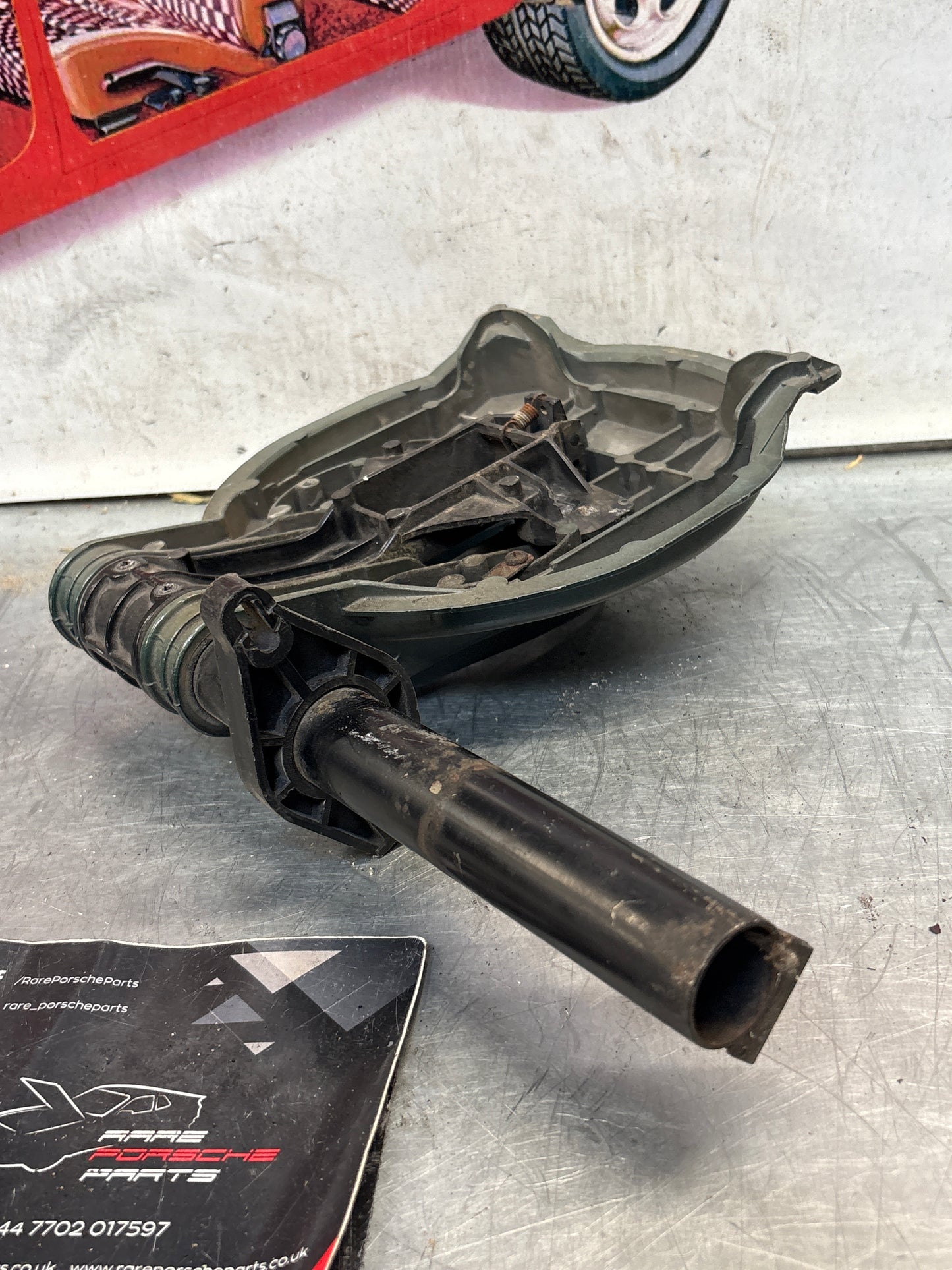 Porsche 928 right headlight swivel frame 92875024902 92875024302 used