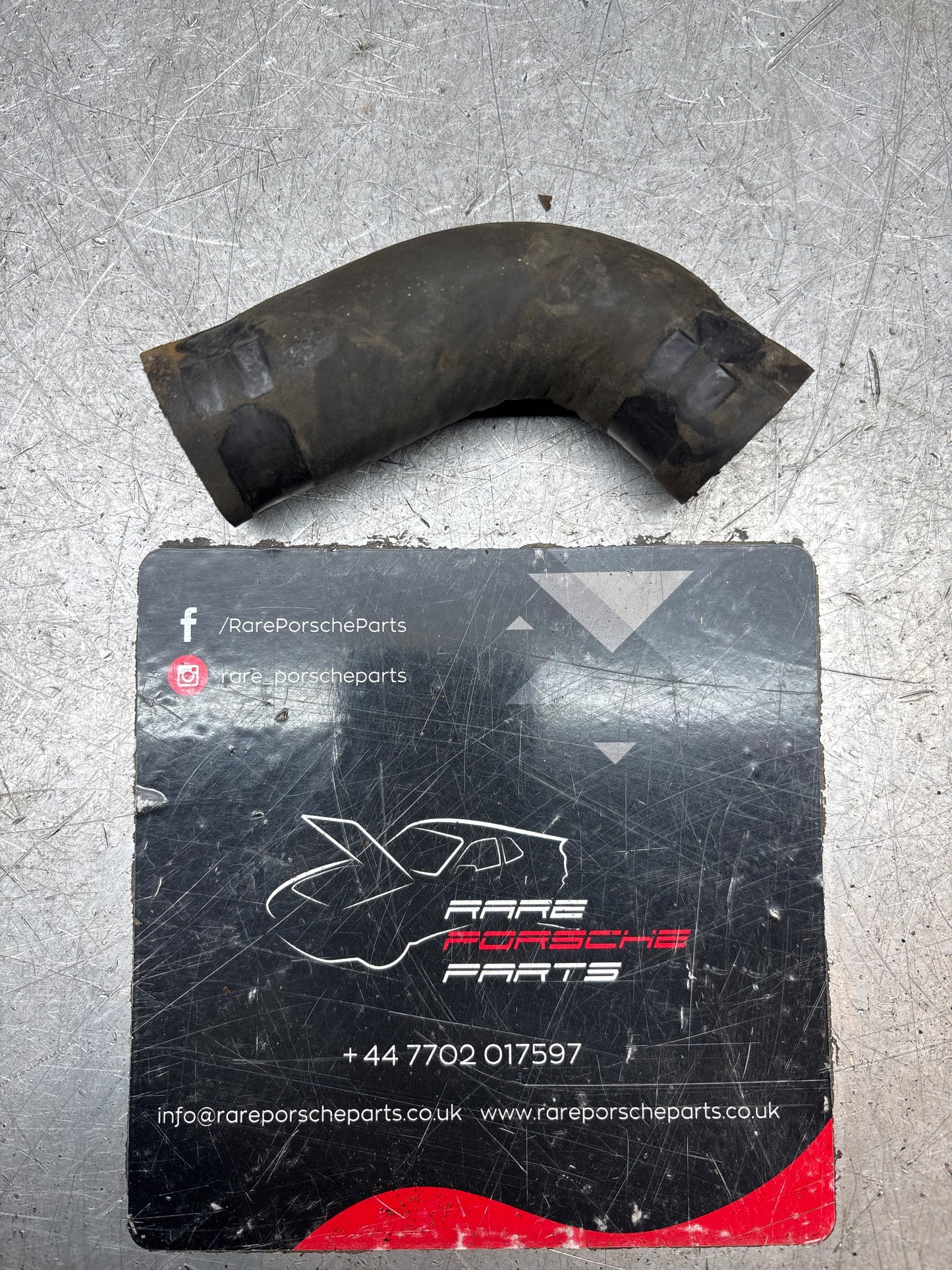 Porsche 944 Turbo water hose to cross over pipe, 95110624502, used