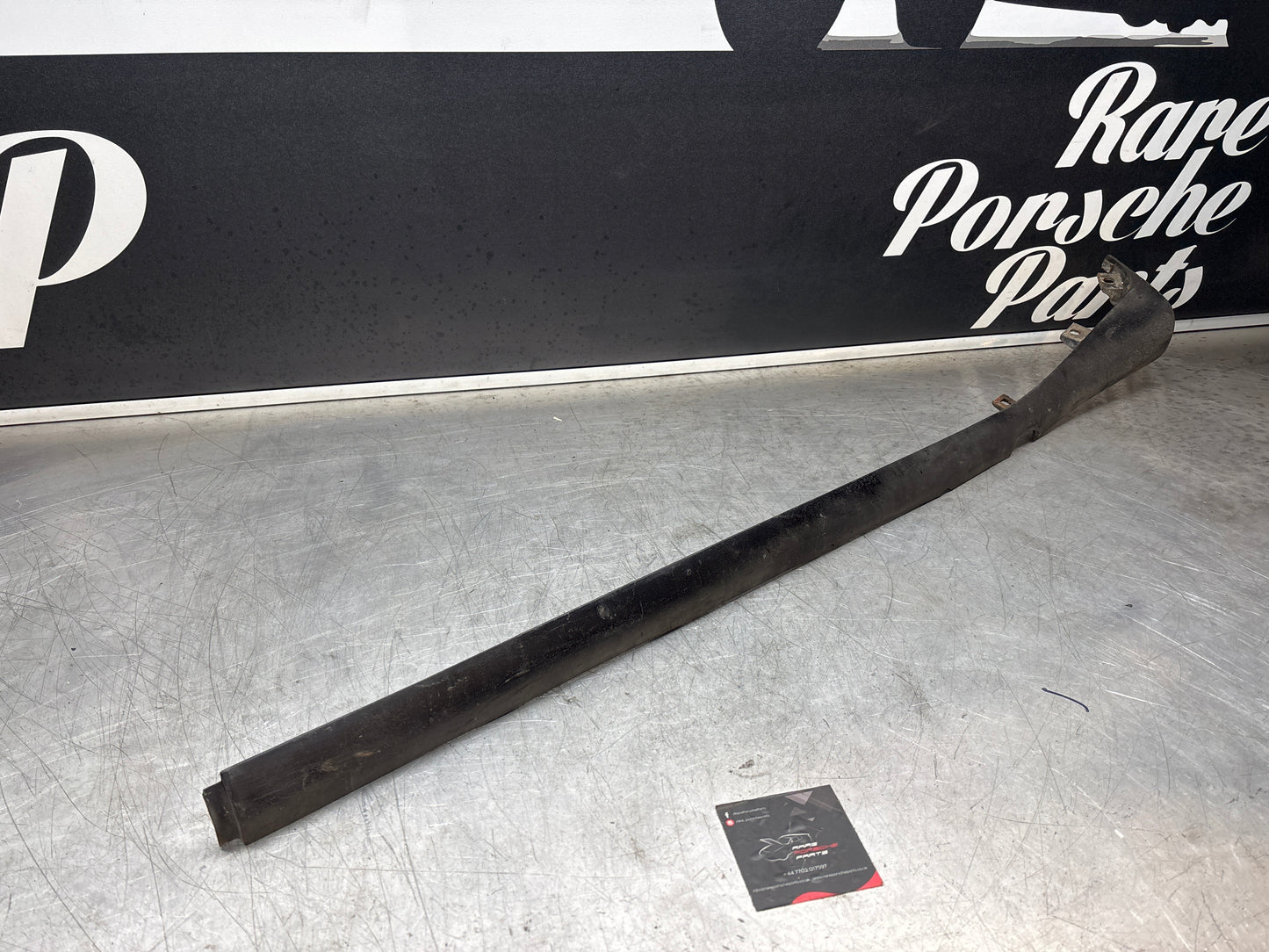 Porsche 944 lower door sill trim molding left side, used 95155919500