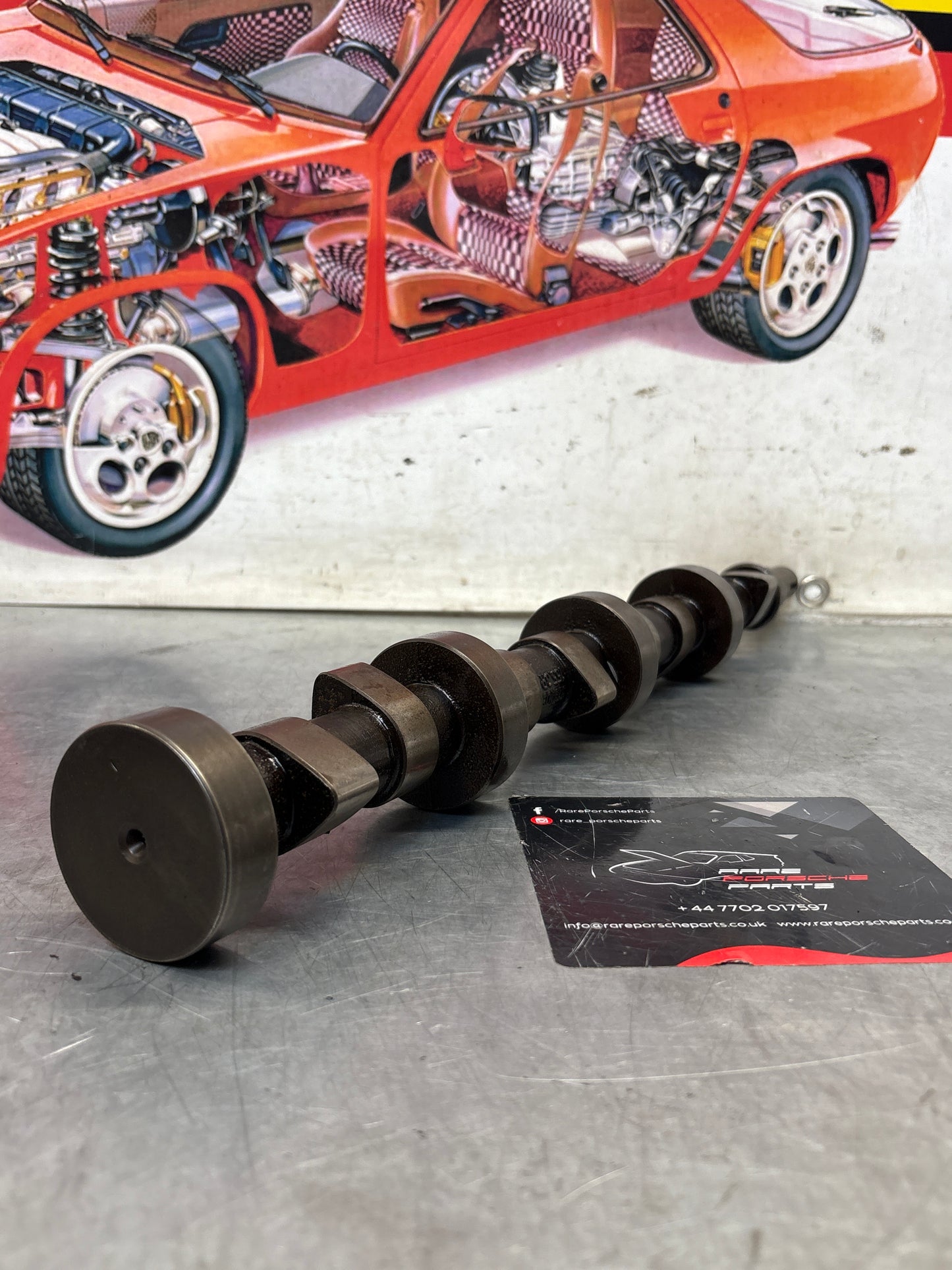 Porsche 928 cam shaft, used 9281051553R