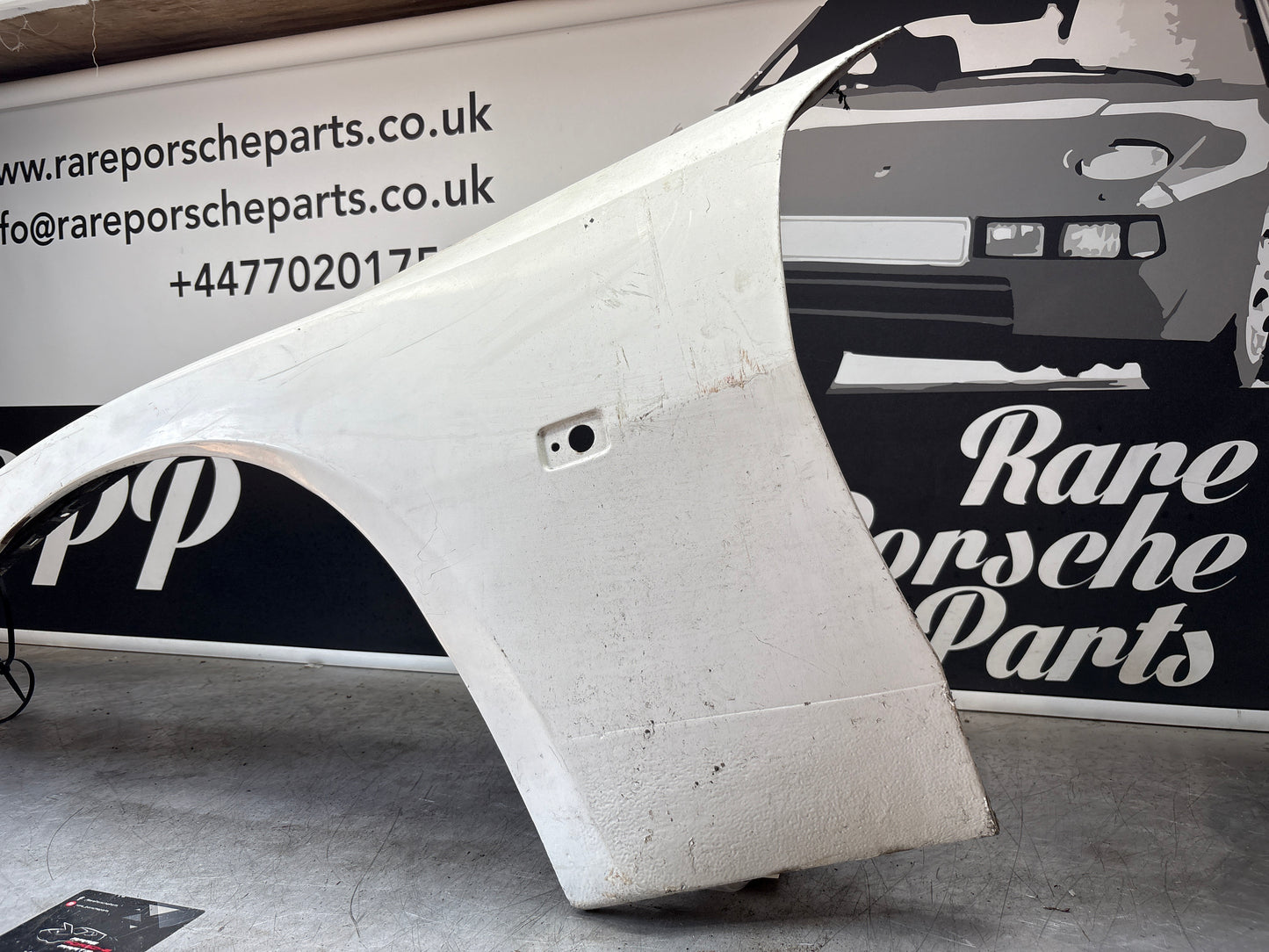 Porsche 944 early left front wing, please see photos, used