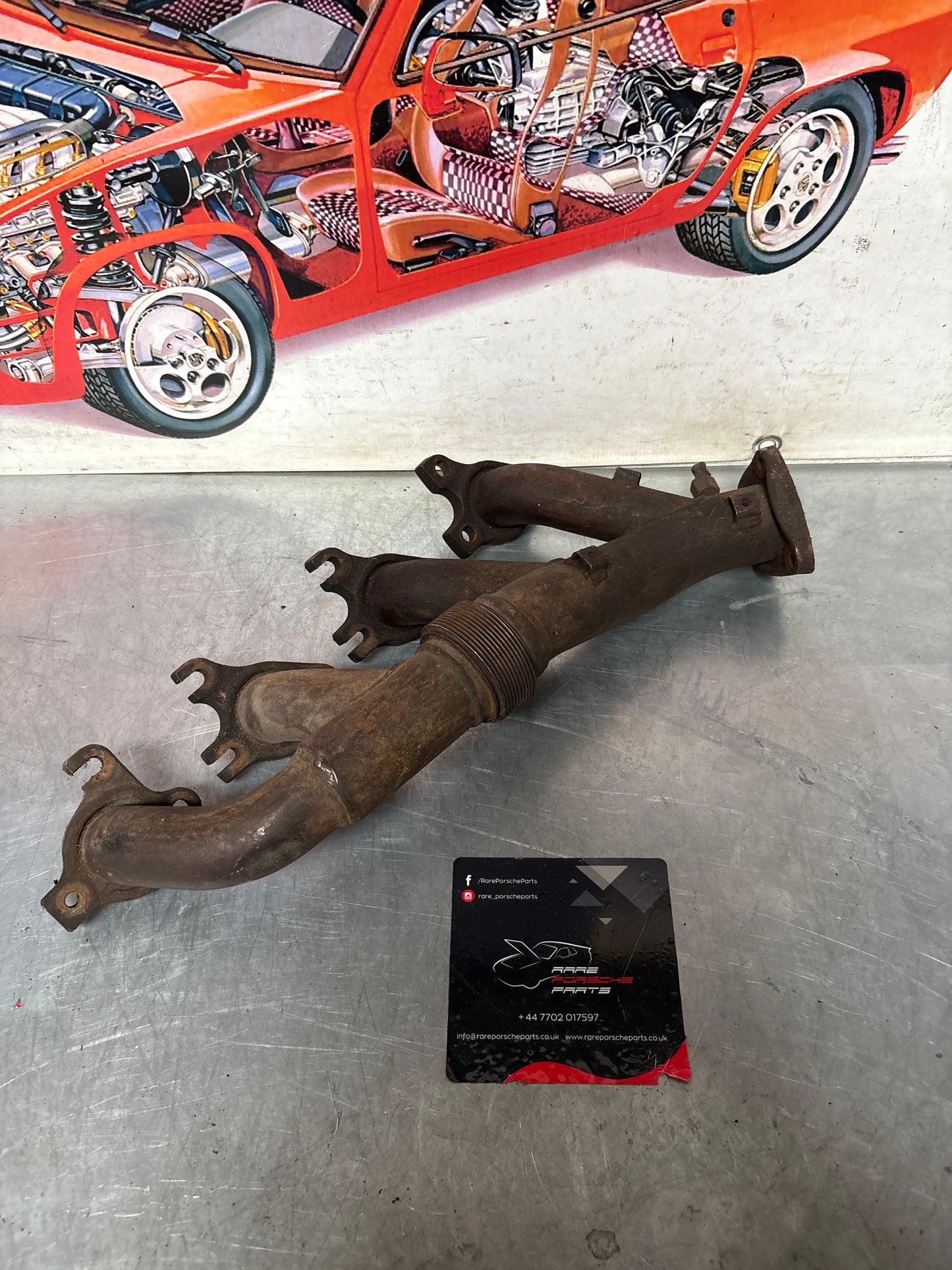 Porsche 928 S4 exhaust manifold, left 92811114507, used