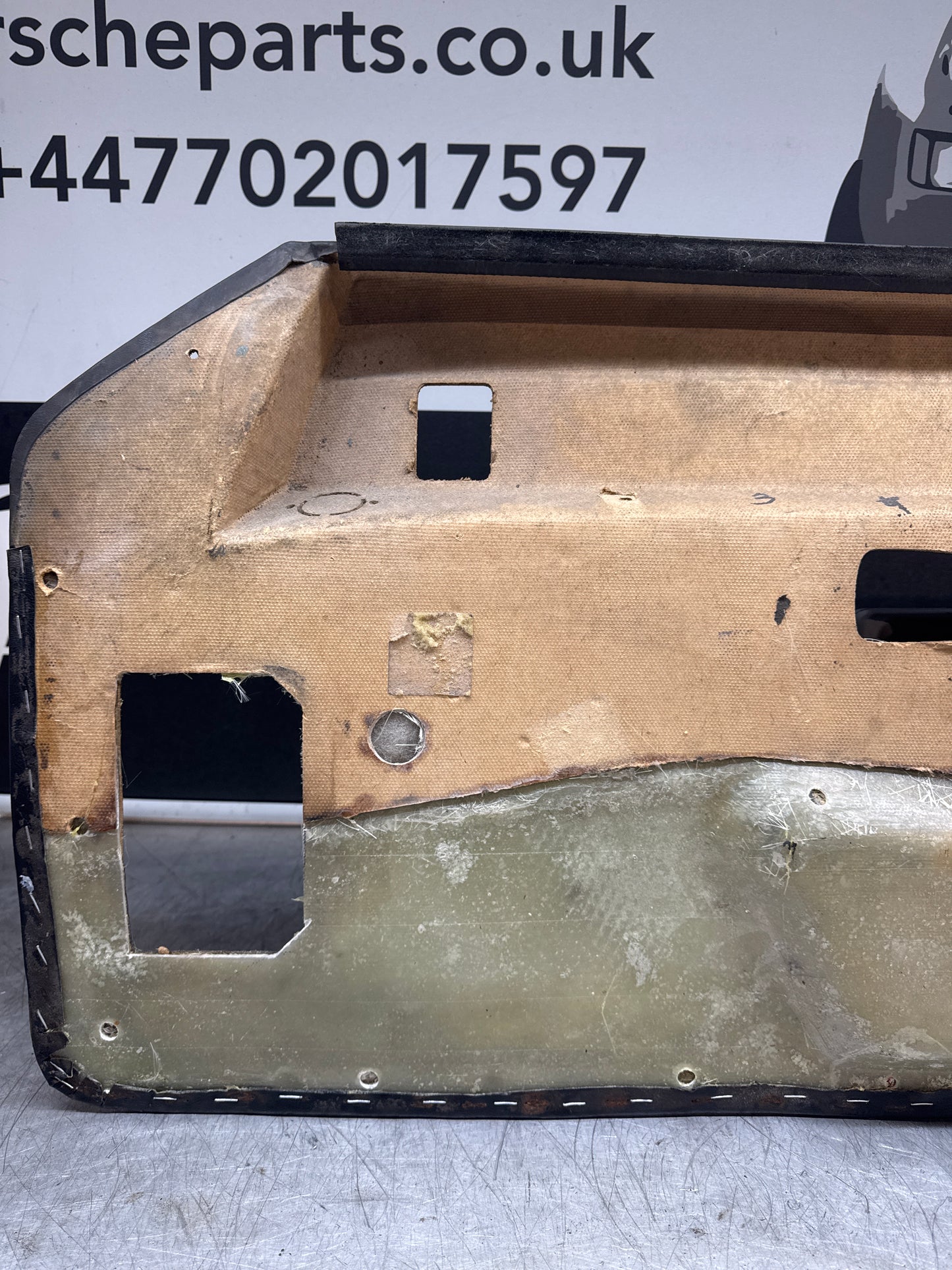 Porsche 924/ Early 944 black RHD Left door card. Fibreglass repaired. 477867012