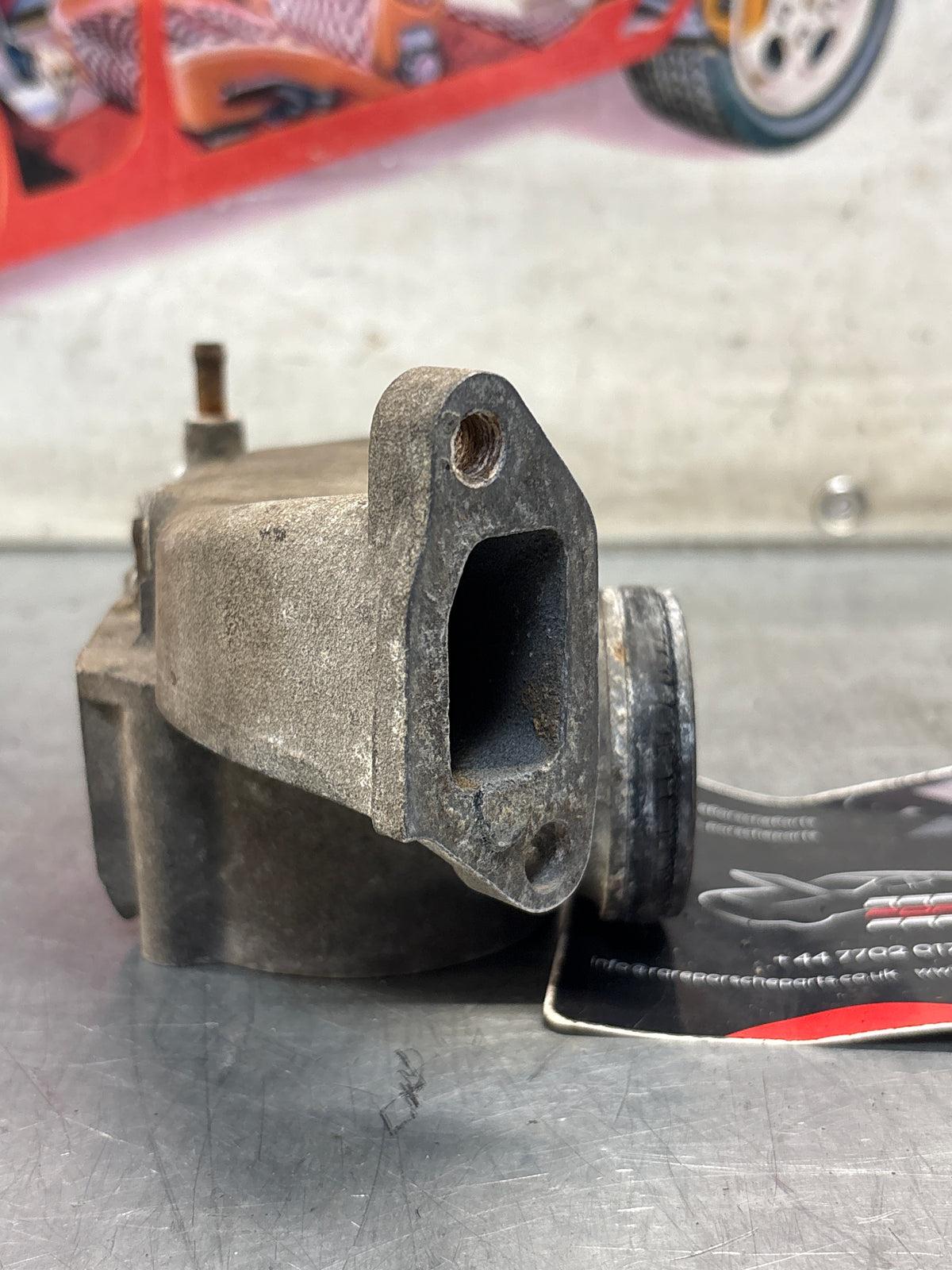 Porsche 928 thermostat housing, 9281061613R Used