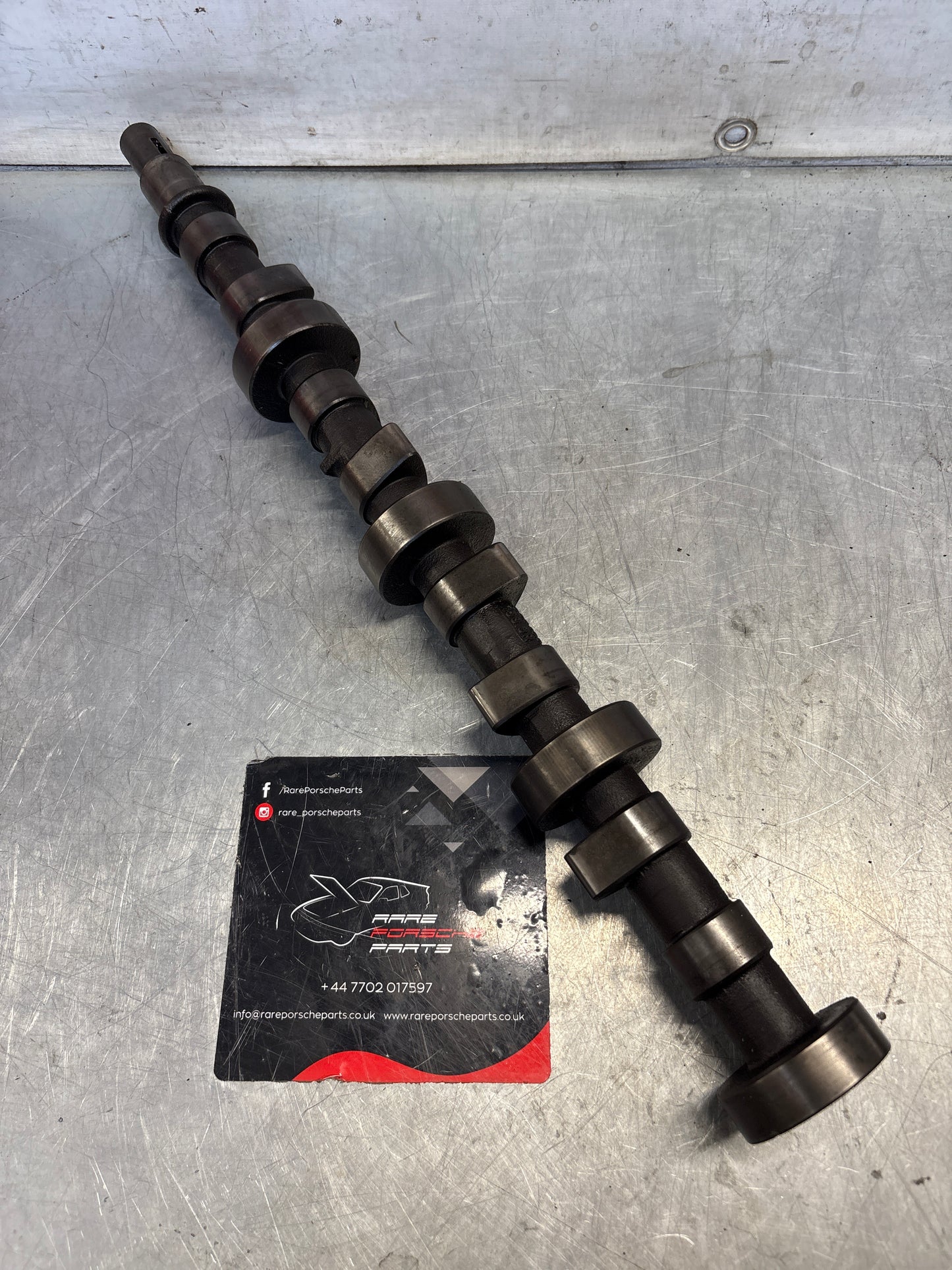 Porsche 928 cam shaft, used 9281051563R