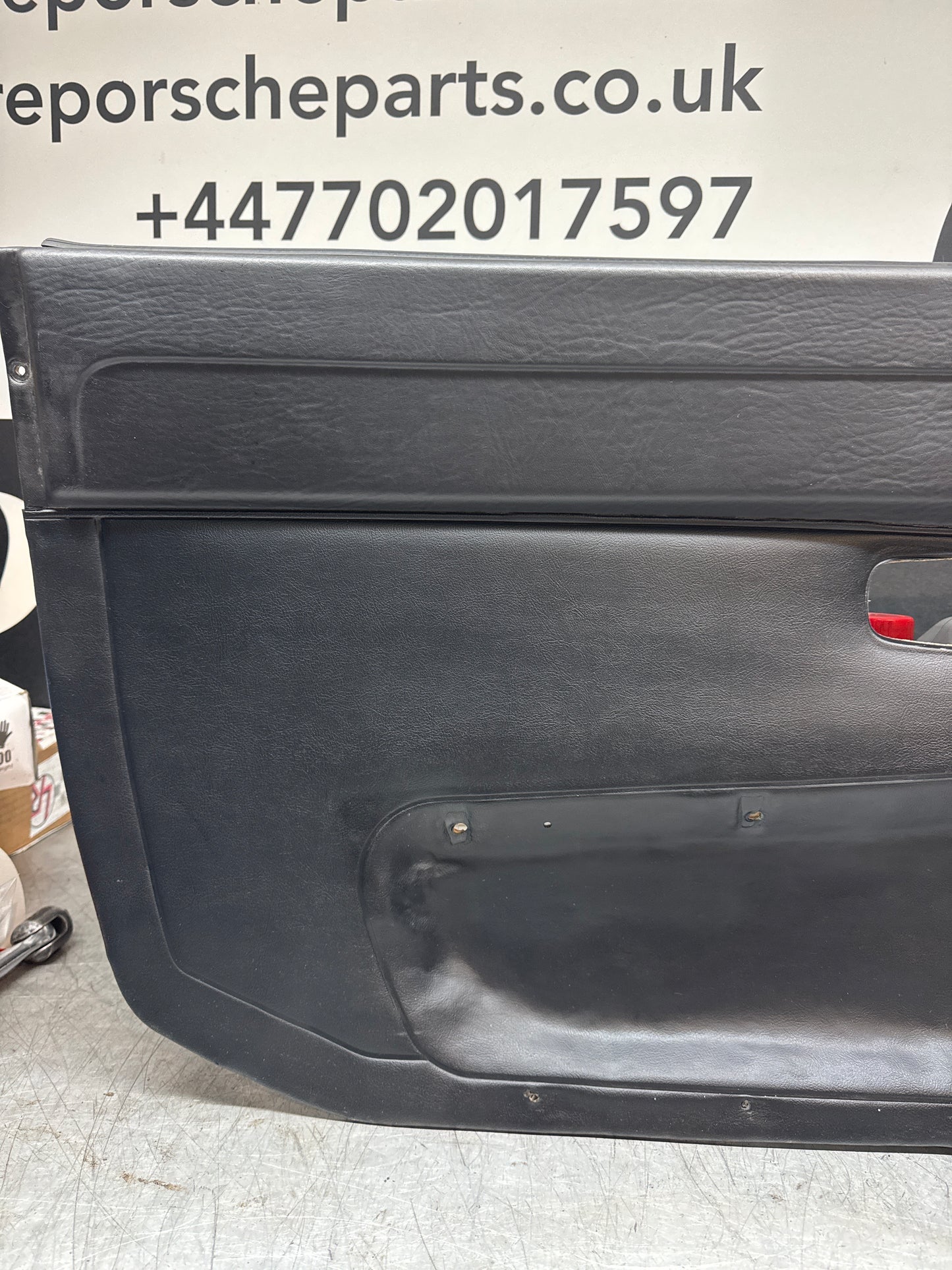 Porsche 924/ Early 944 black RHD Left door card. Fibreglass repaired. 477867012