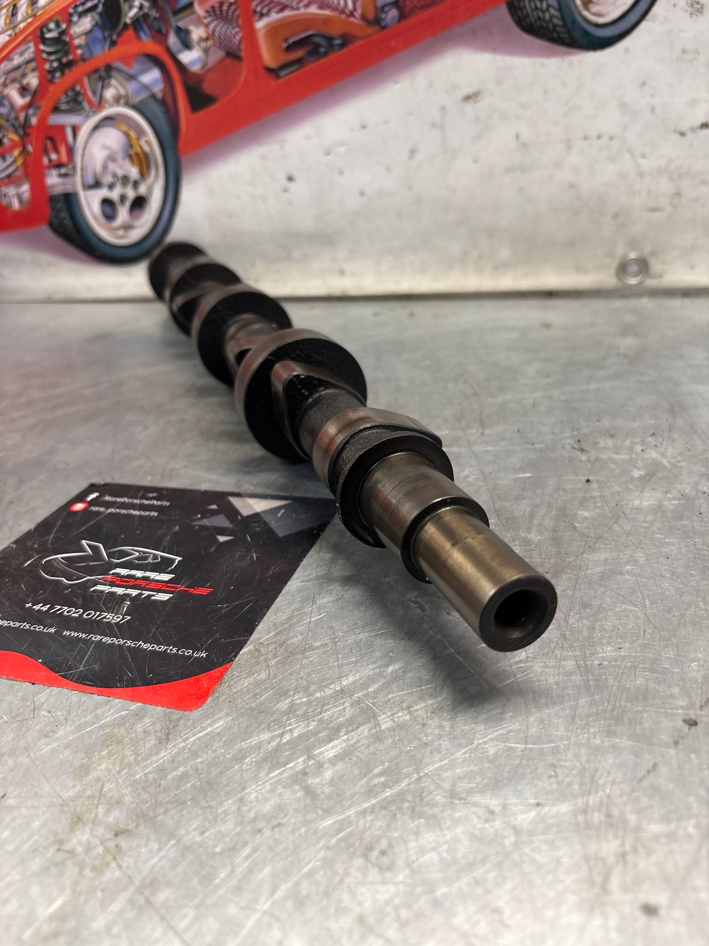 Porsche 928 cam shaft, used 9281051870R